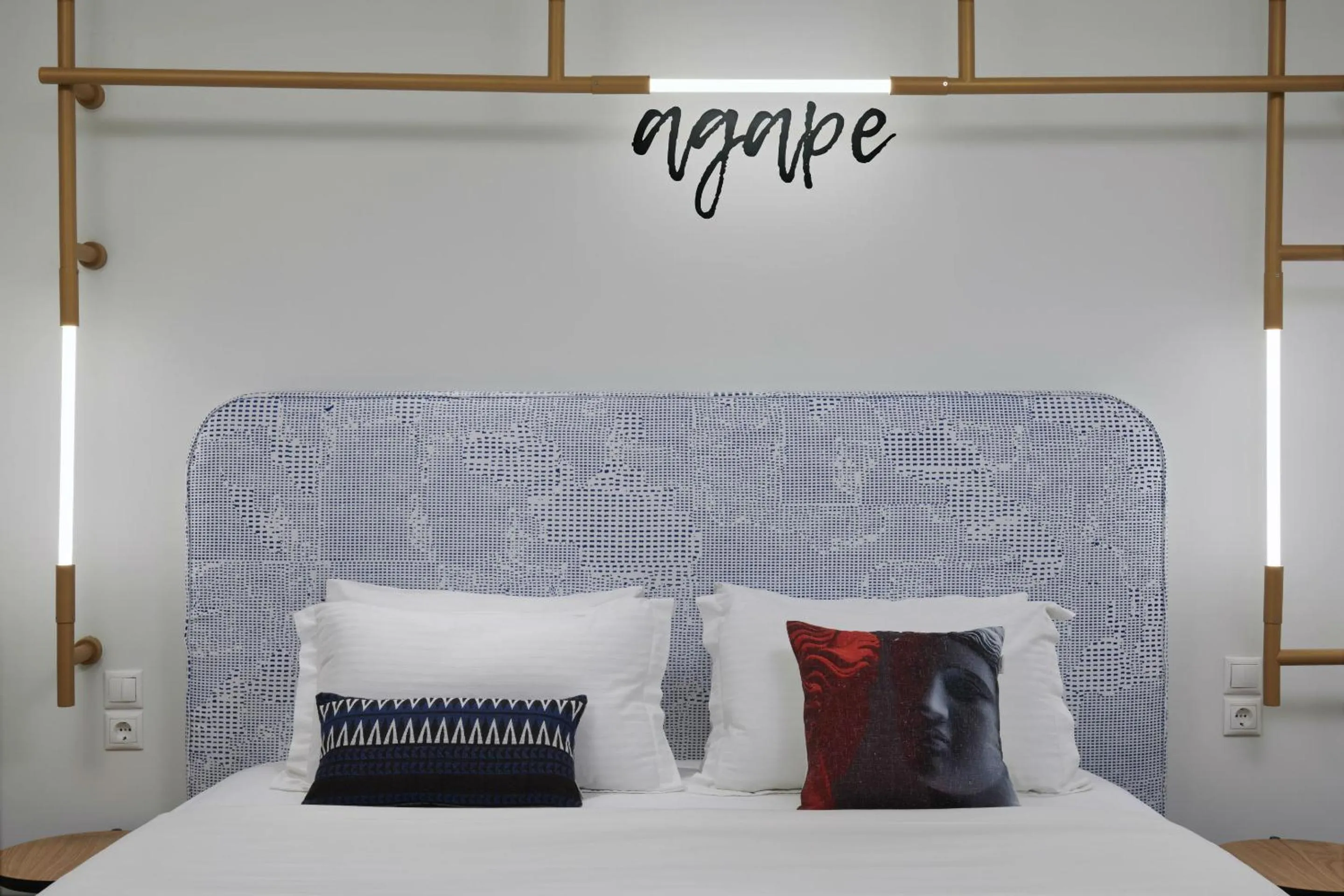 Bed in Thomais Boutique Hotel