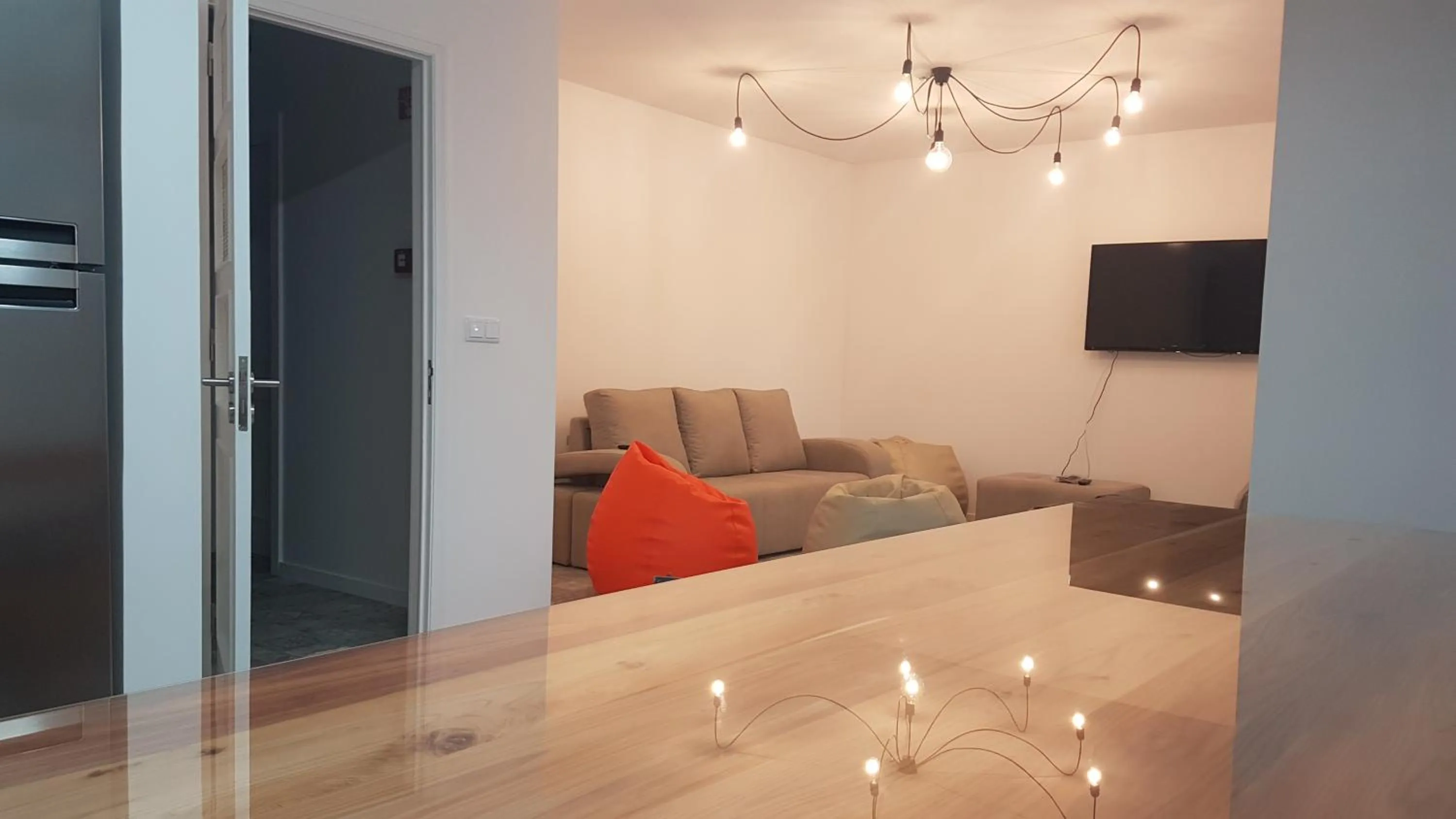 Communal lounge/ TV room in City's Hostel Ponta Delgada