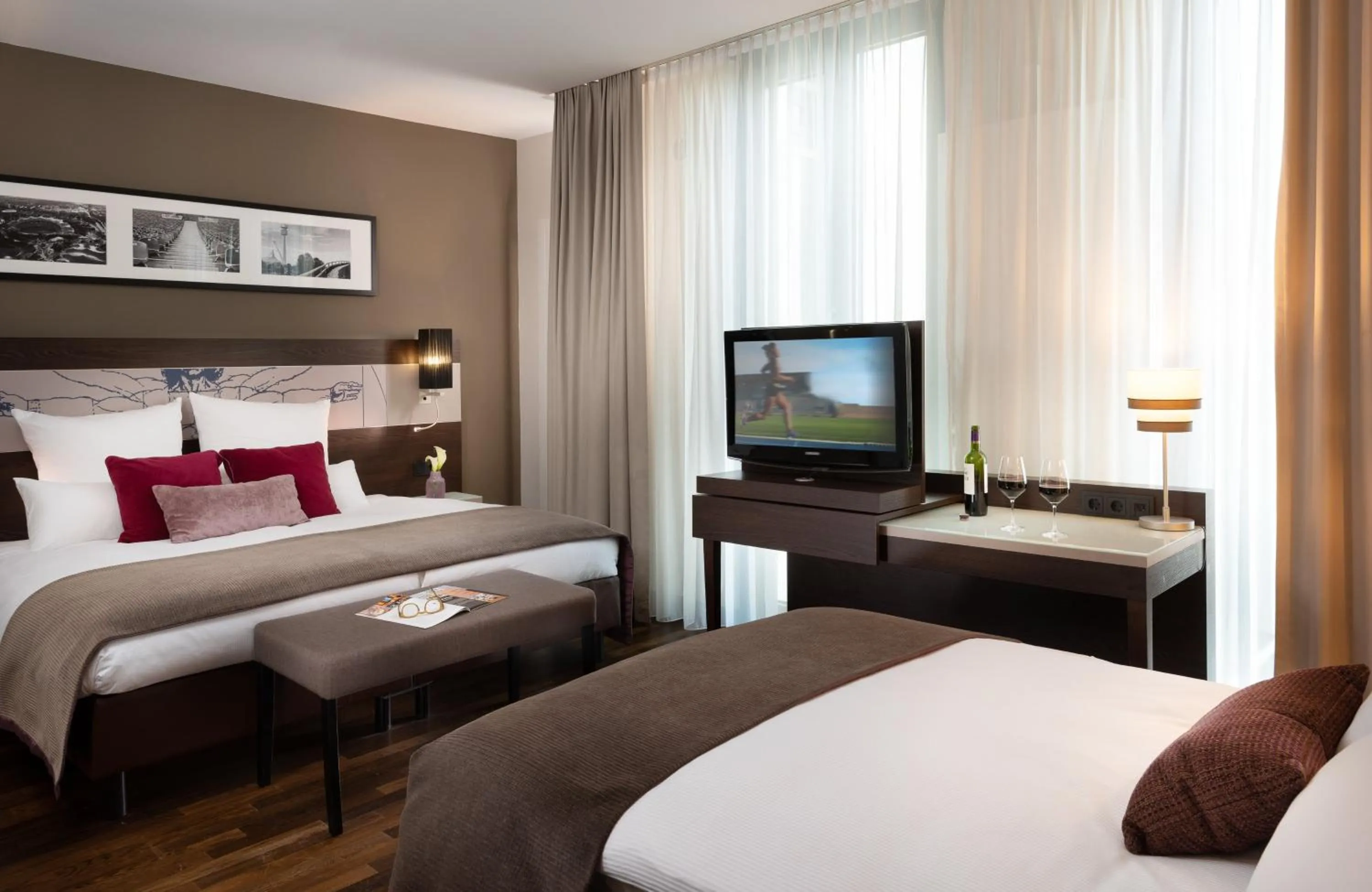 Photo of the whole room, Bed in Leonardo Royal Hotel Munich