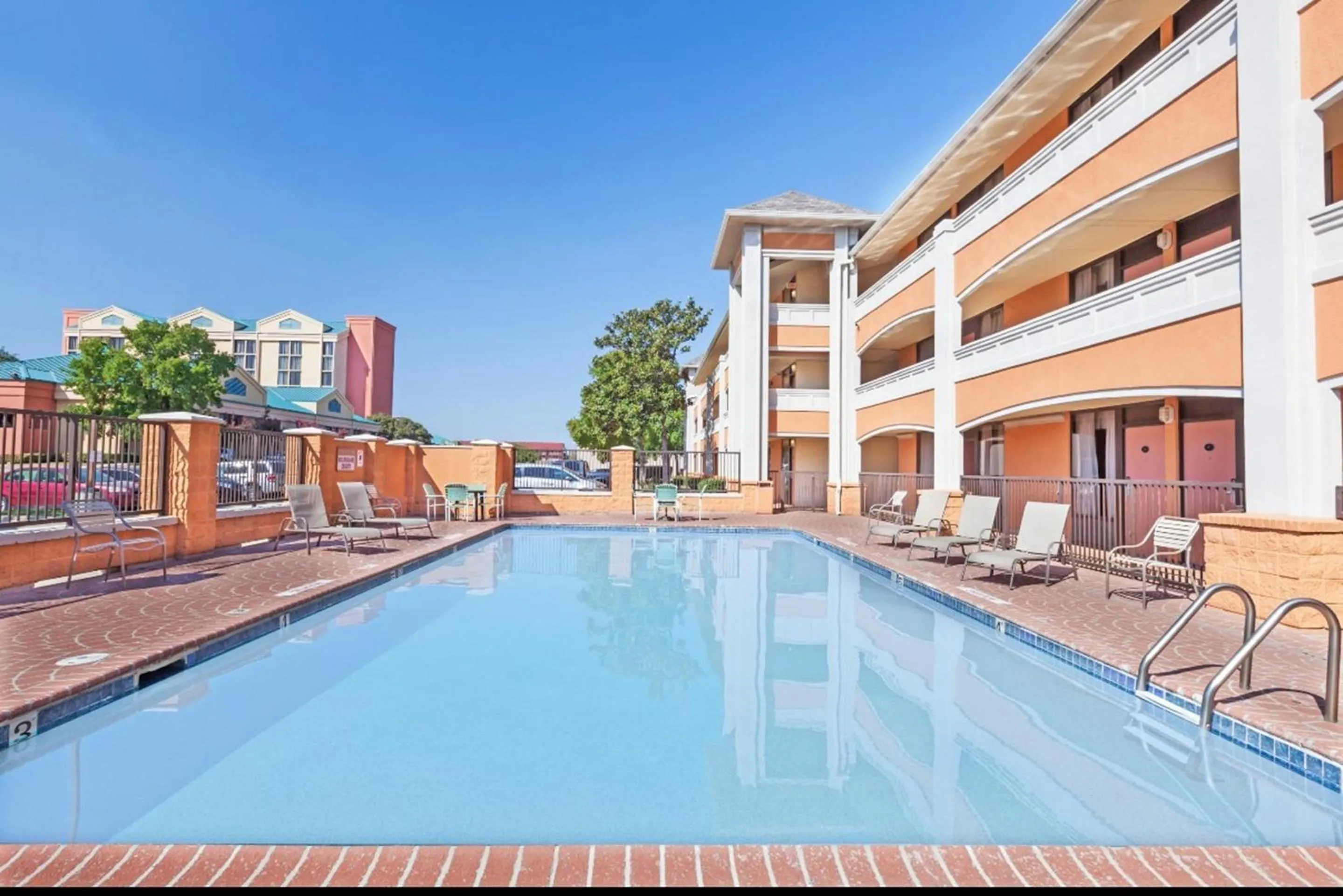 Pool view in SureStay by Best Western Irving Grapevine DFW North