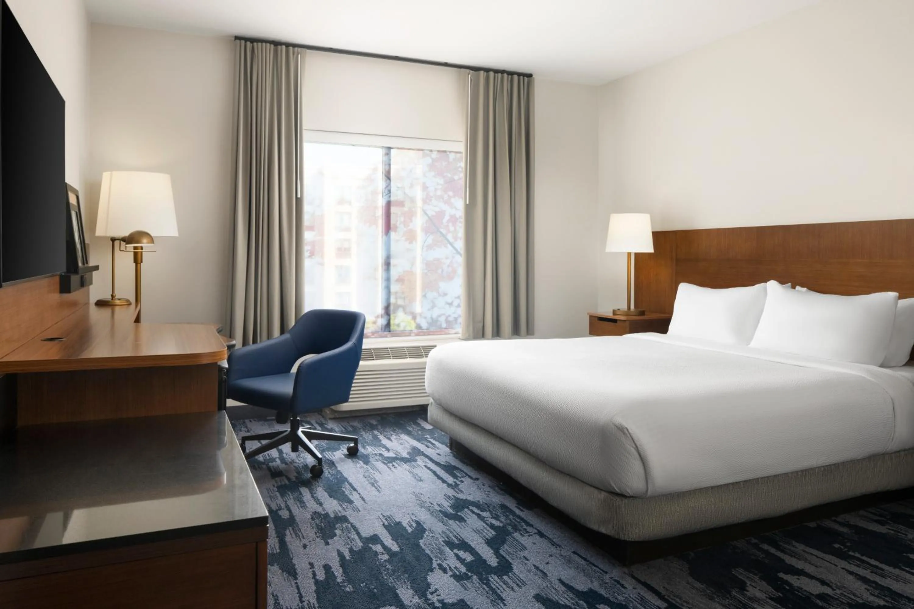Bed in Fairfield Inn & Suites by Marriott Newark Liberty International Airport