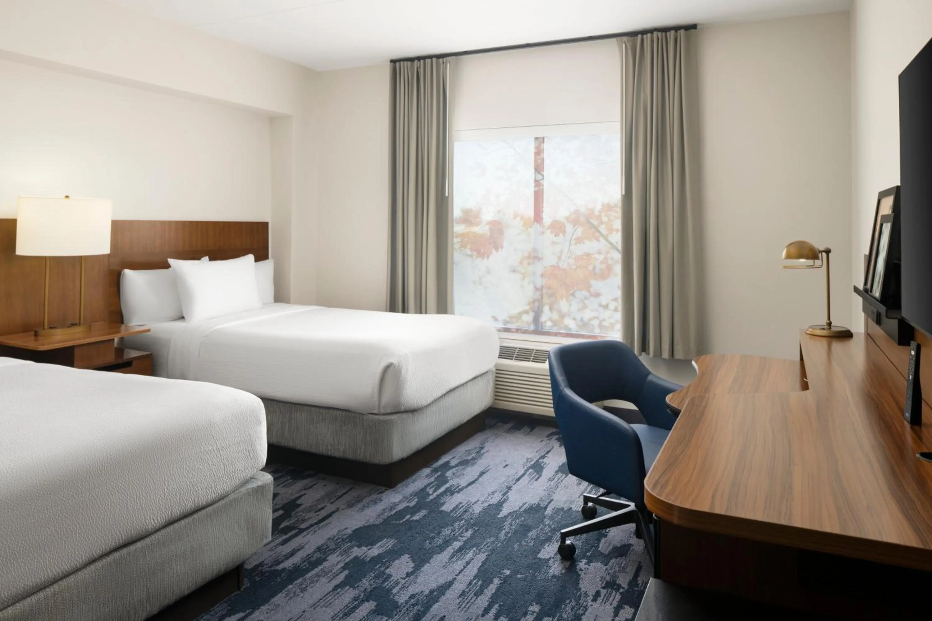 Bed in Fairfield Inn & Suites by Marriott Newark Liberty International Airport
