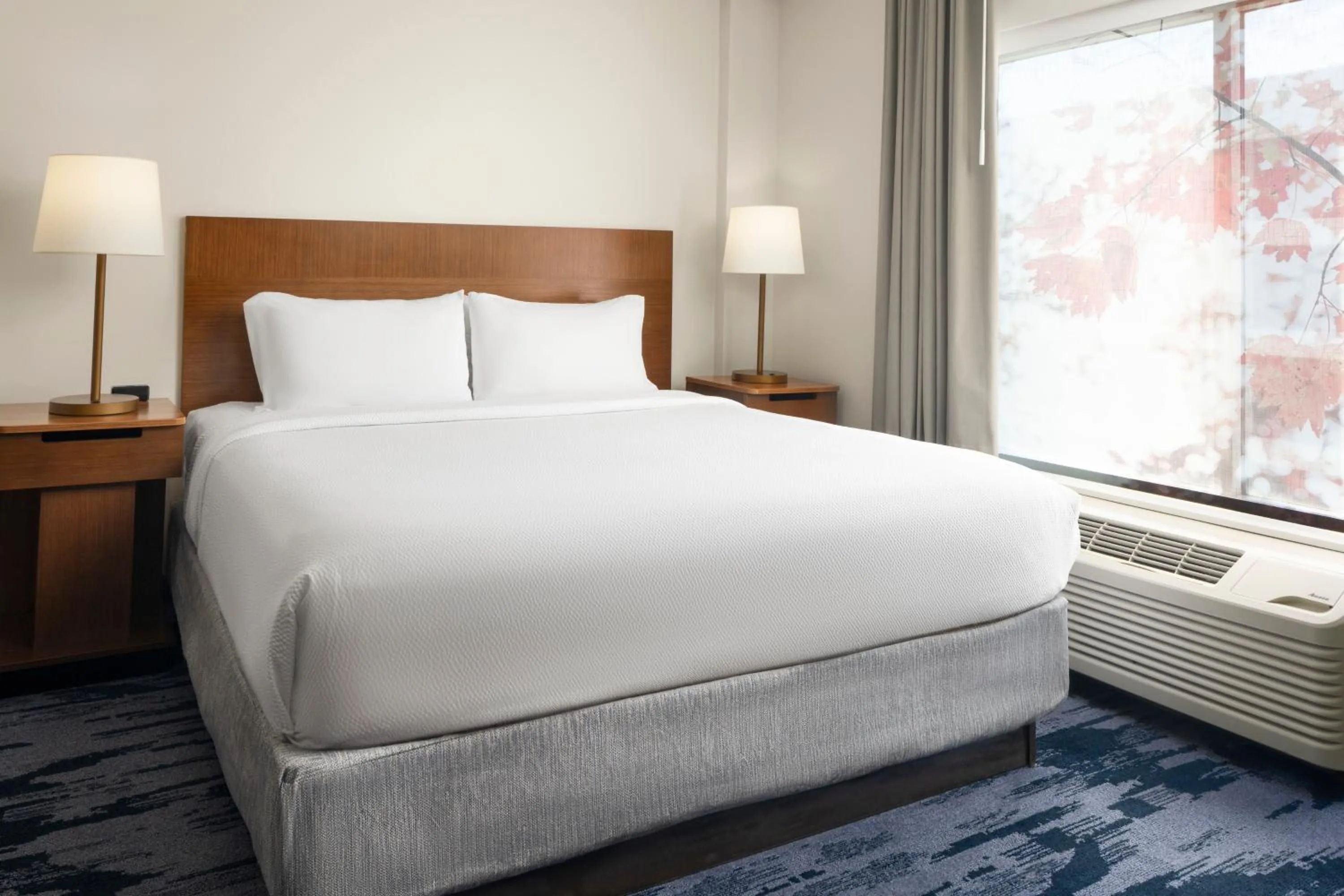 Bed in Fairfield Inn & Suites by Marriott Newark Liberty International Airport