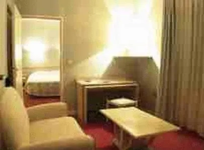 Photo of the whole room, Bed in Le Central