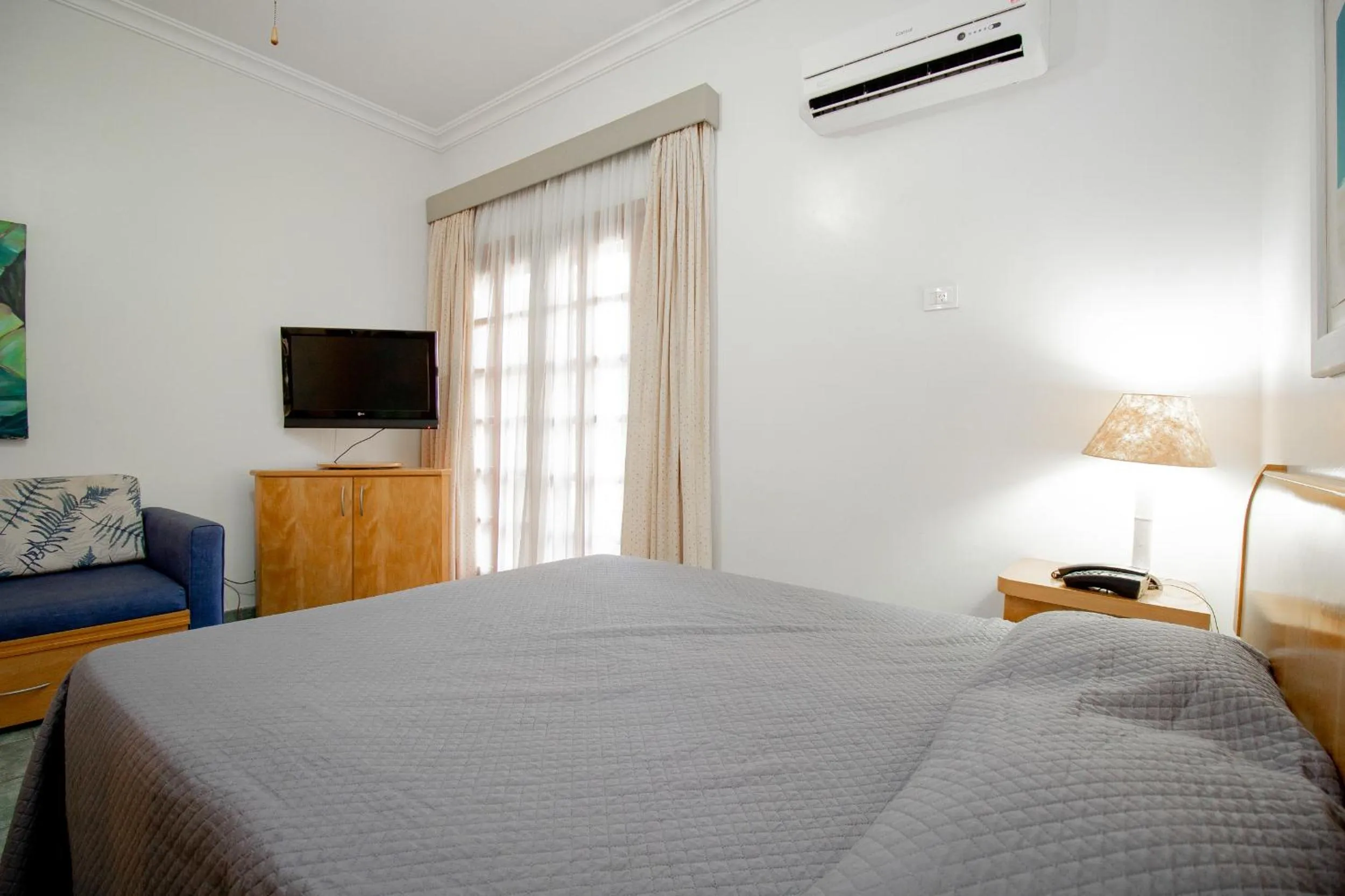 Bed in Ilha Flat Hotel