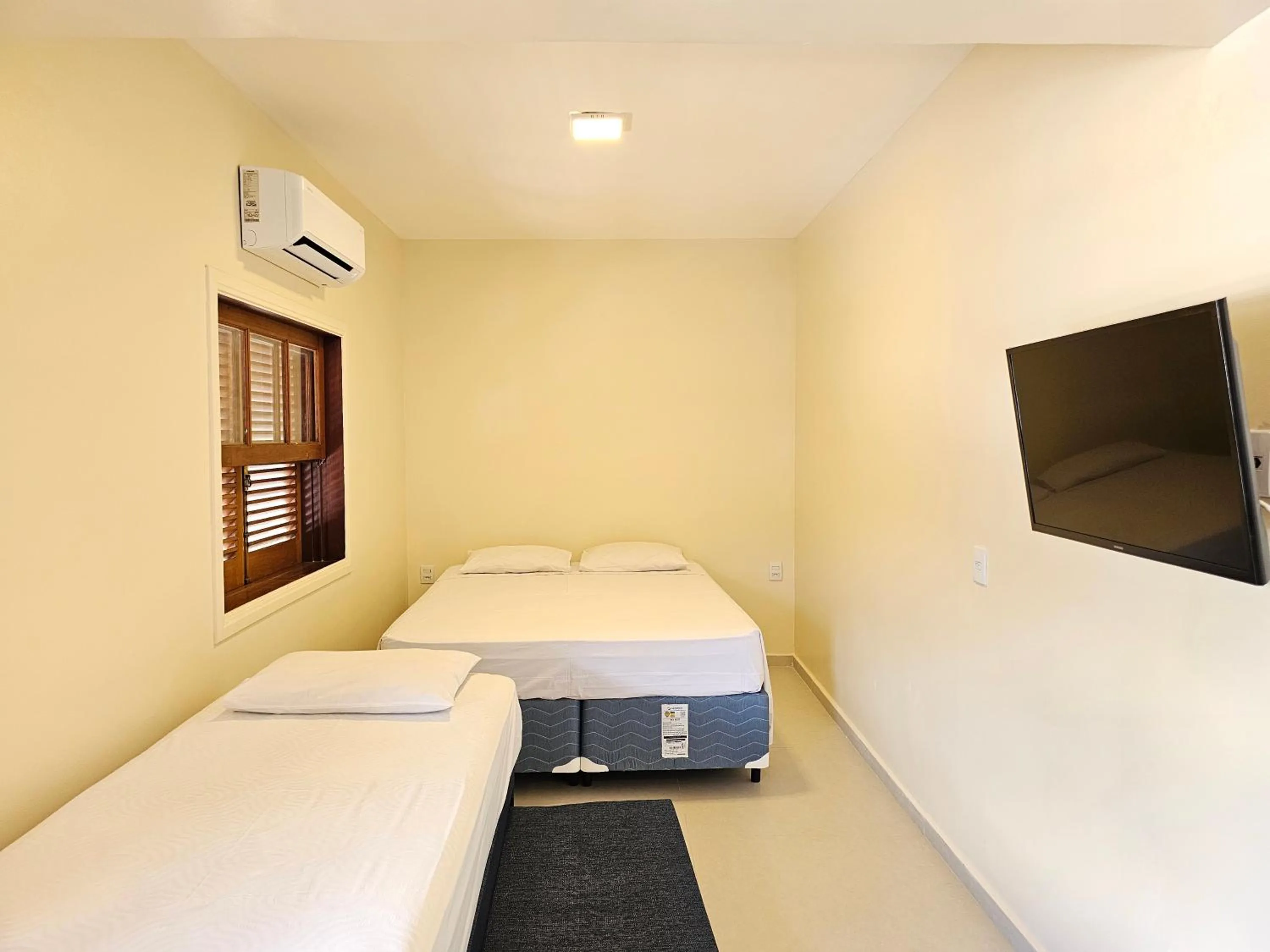 Bed in Ilha Flat Hotel