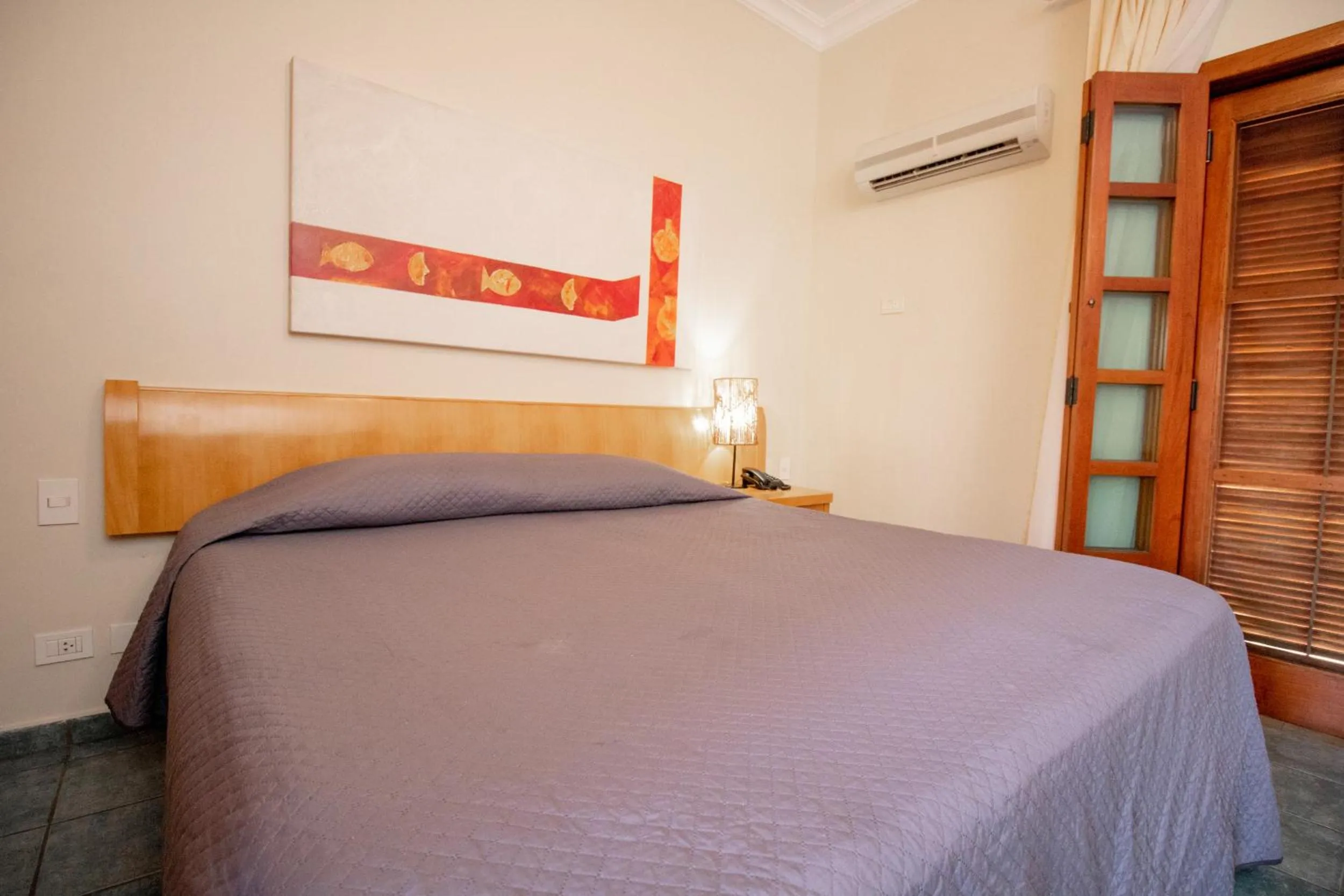Bed in Ilha Flat Hotel