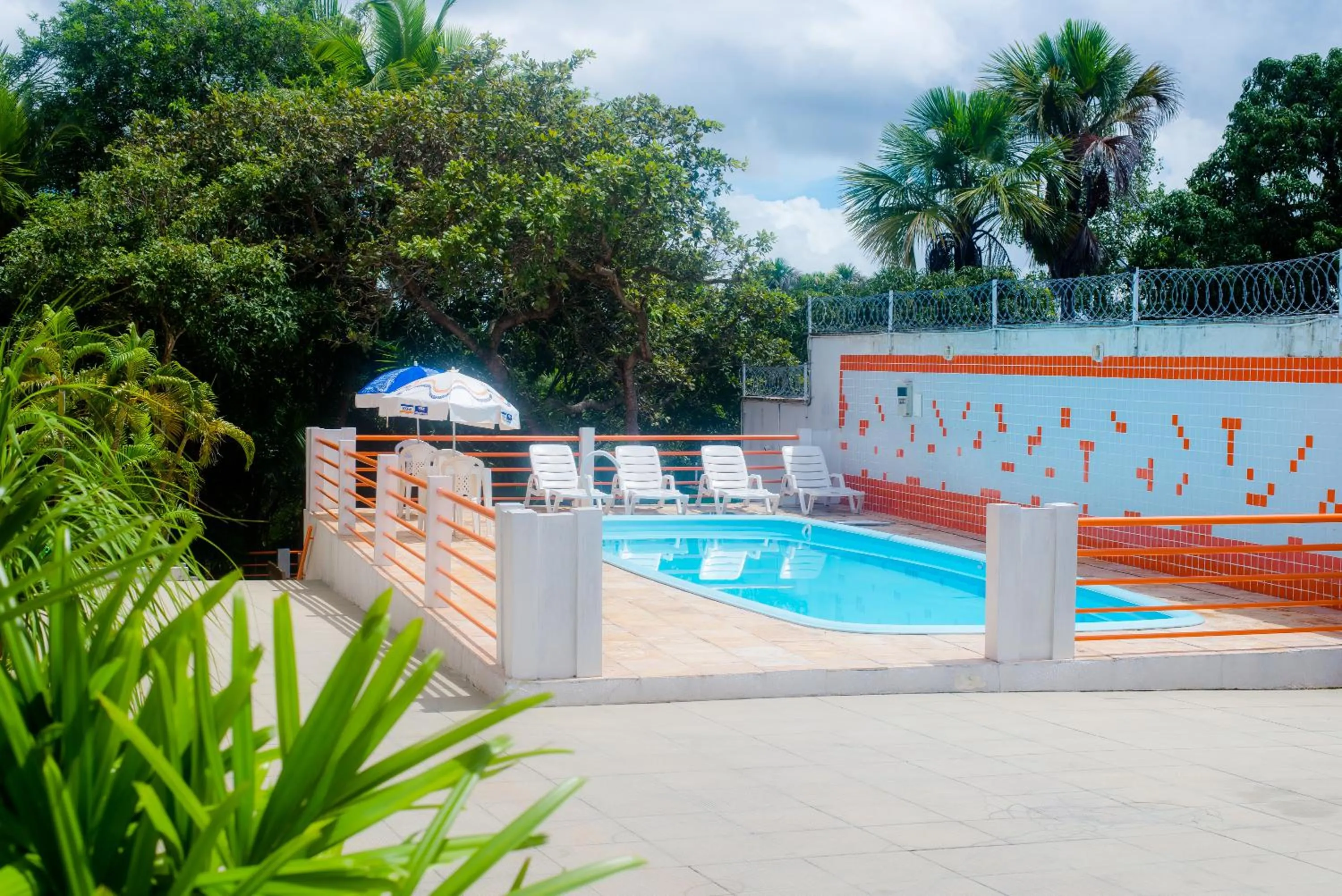 Swimming pool in Pousada Clube Vista do Rio