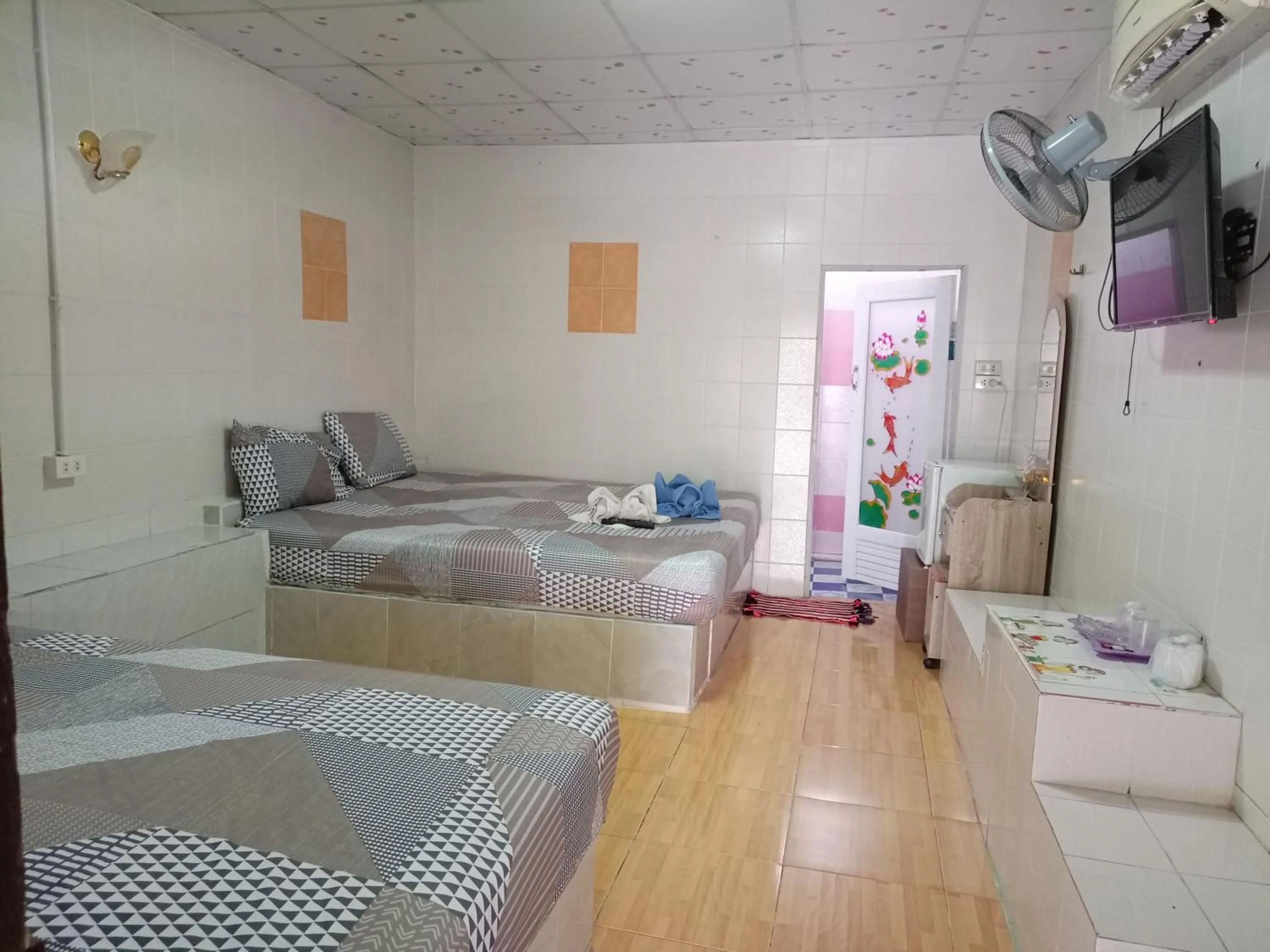 Bed in Kanjana Resort