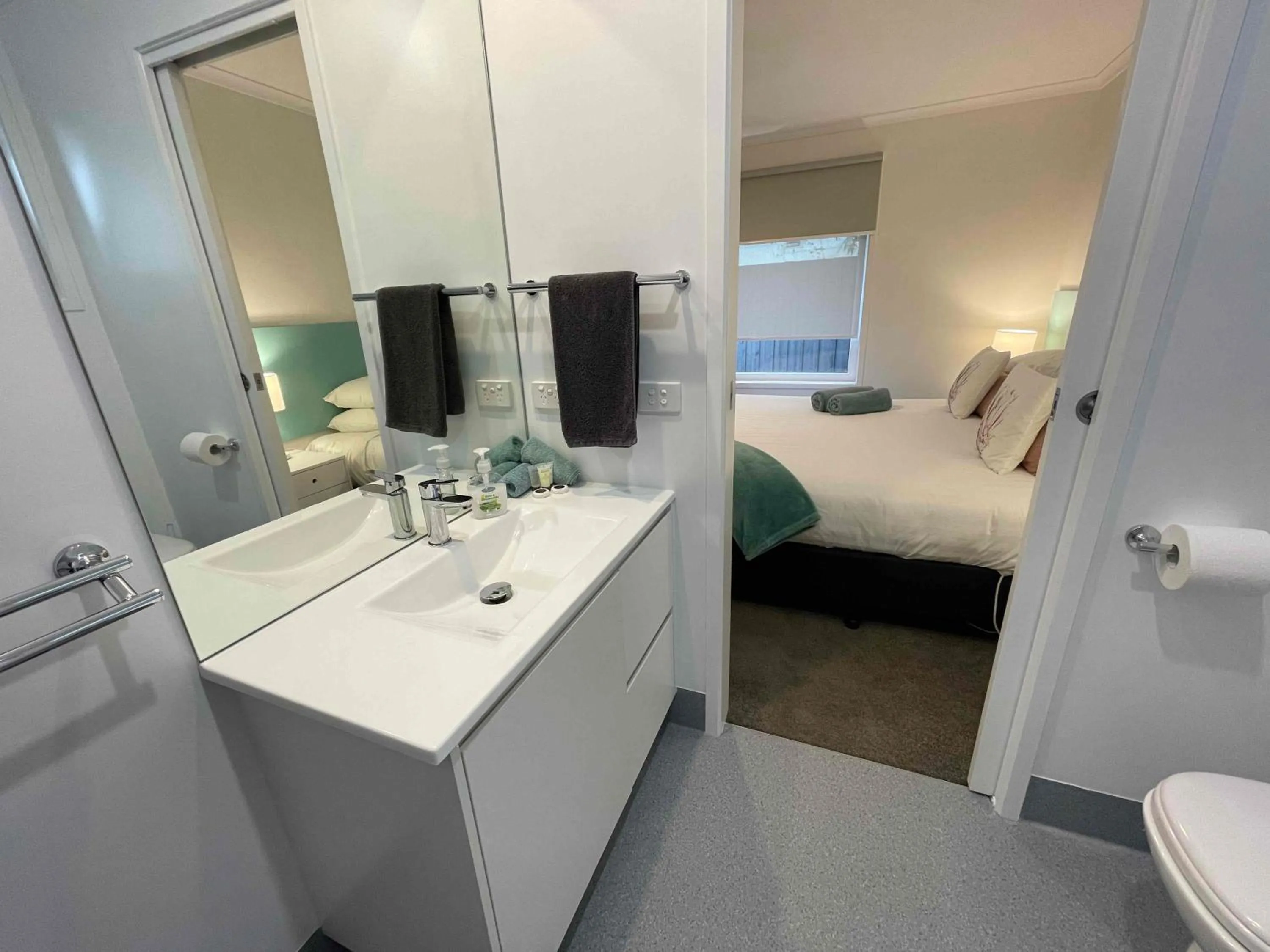 Bed in Botanic City Apartments