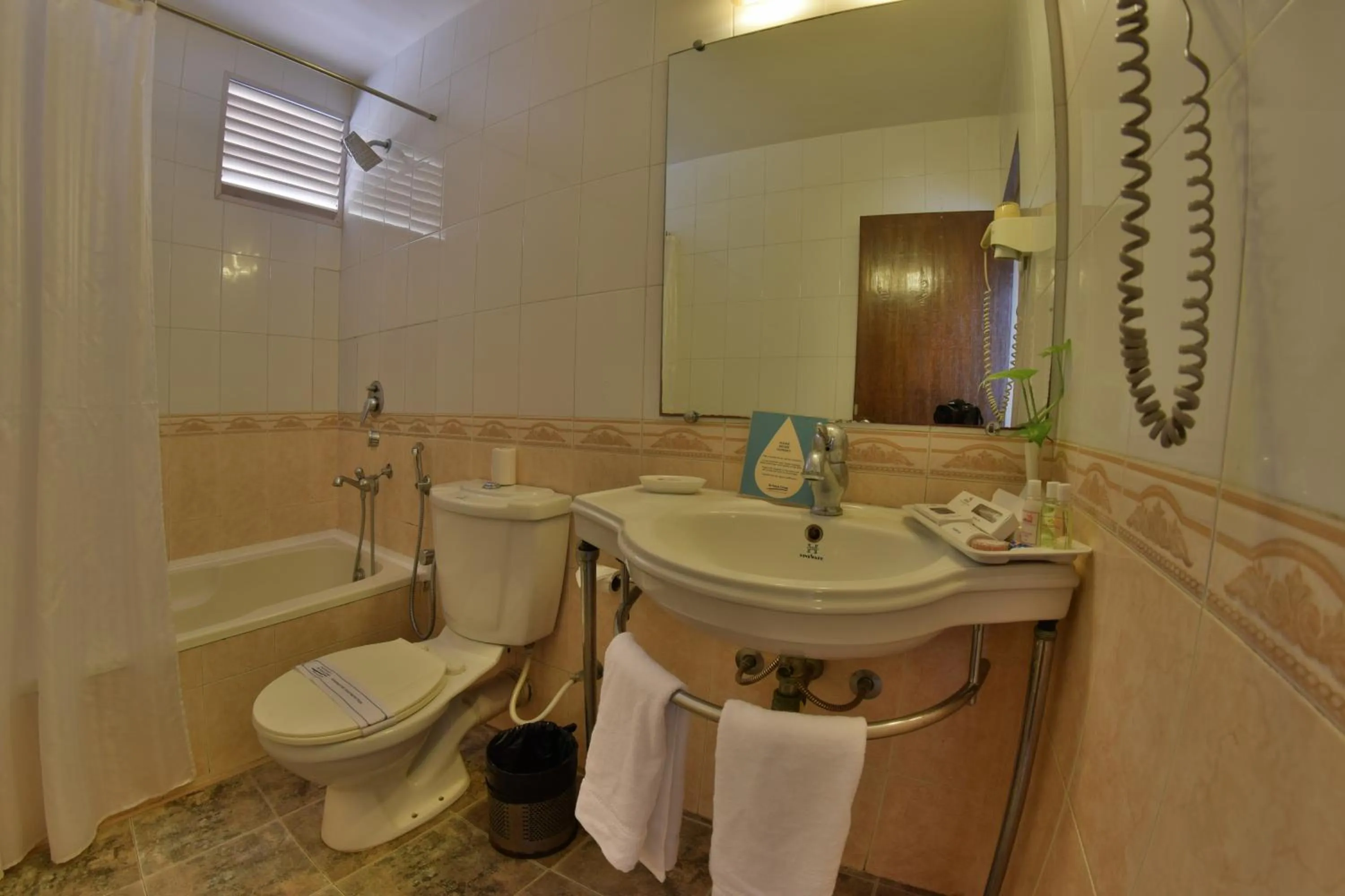 Toilet in Pride Sun Village Resort & Spa