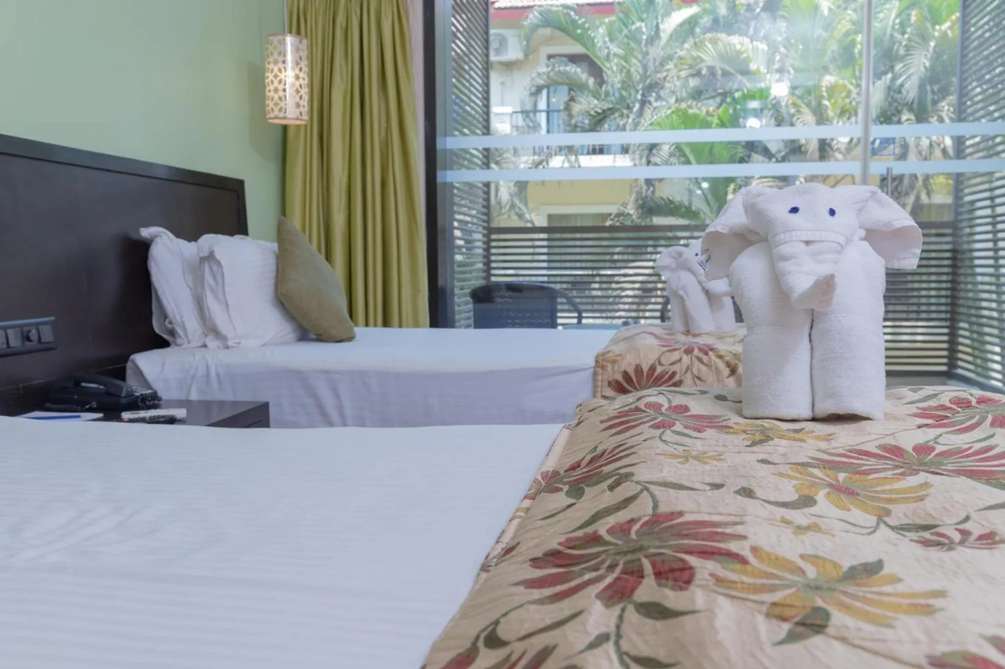 Bed in Kyriad Prestige Calangute Goa by OTHPL