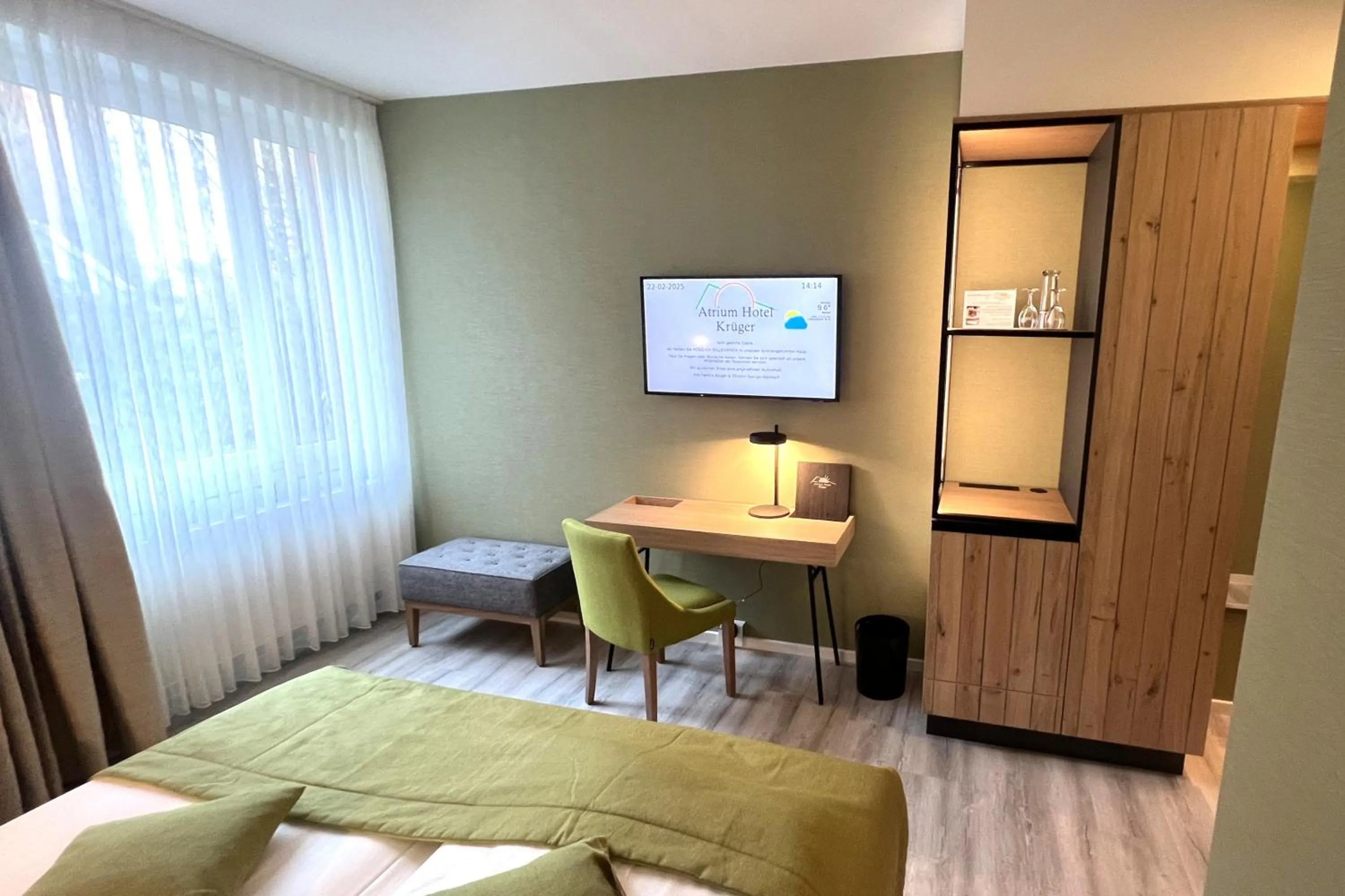 Photo of the whole room, Bed in Atrium Hotel Krüger