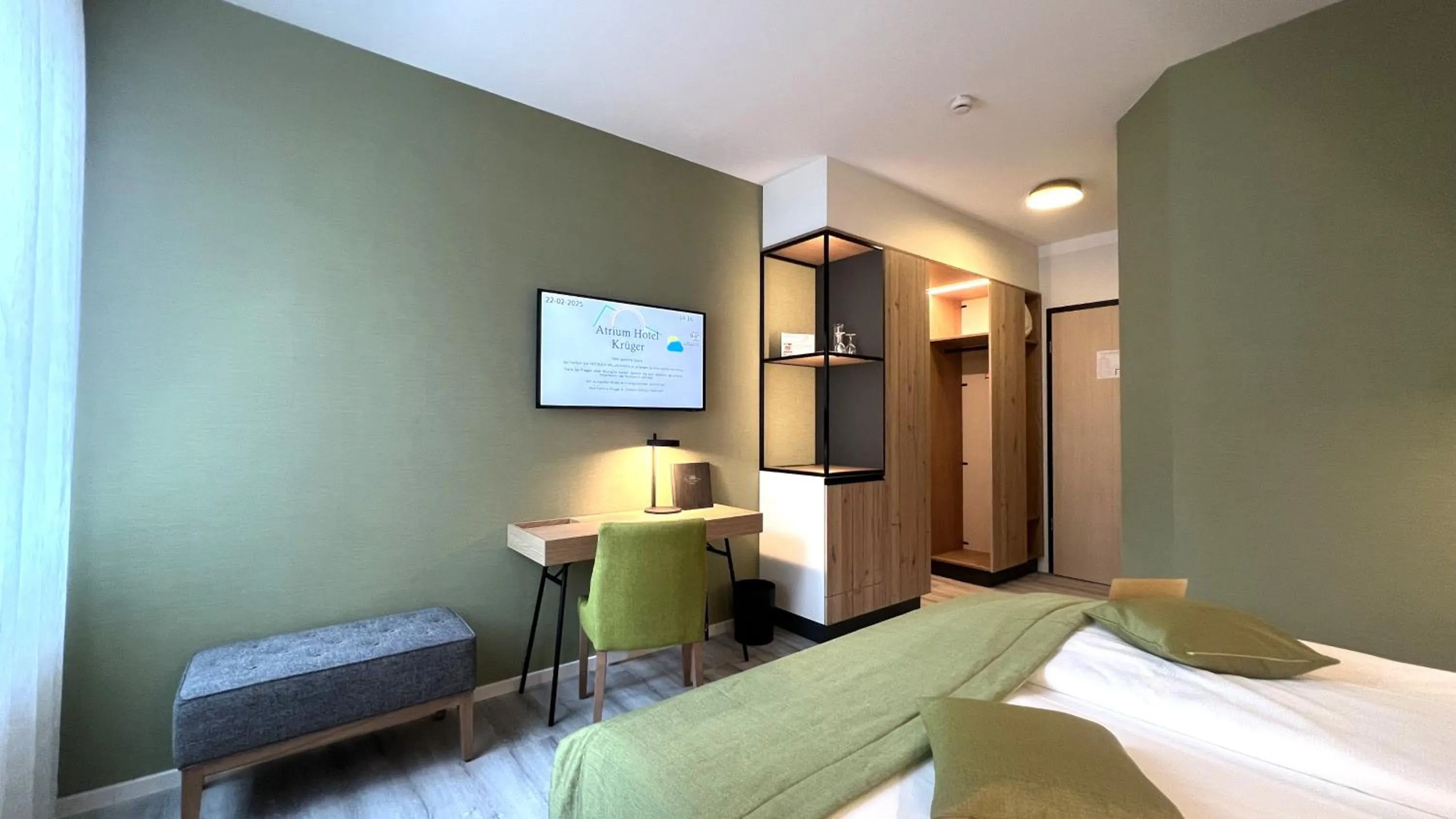 Photo of the whole room, Bed in Atrium Hotel Krüger