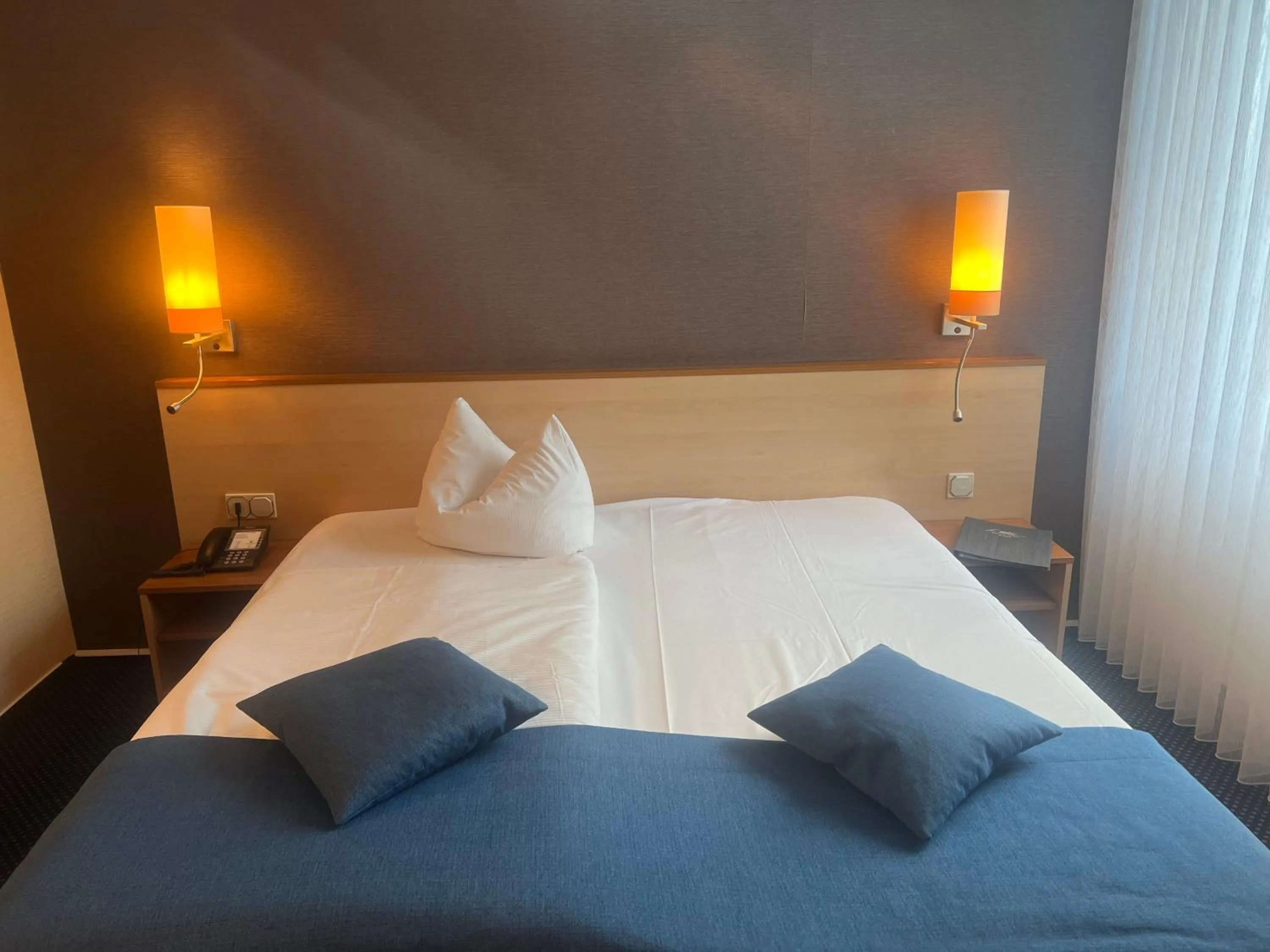 Photo of the whole room, Bed in Atrium Hotel Krüger