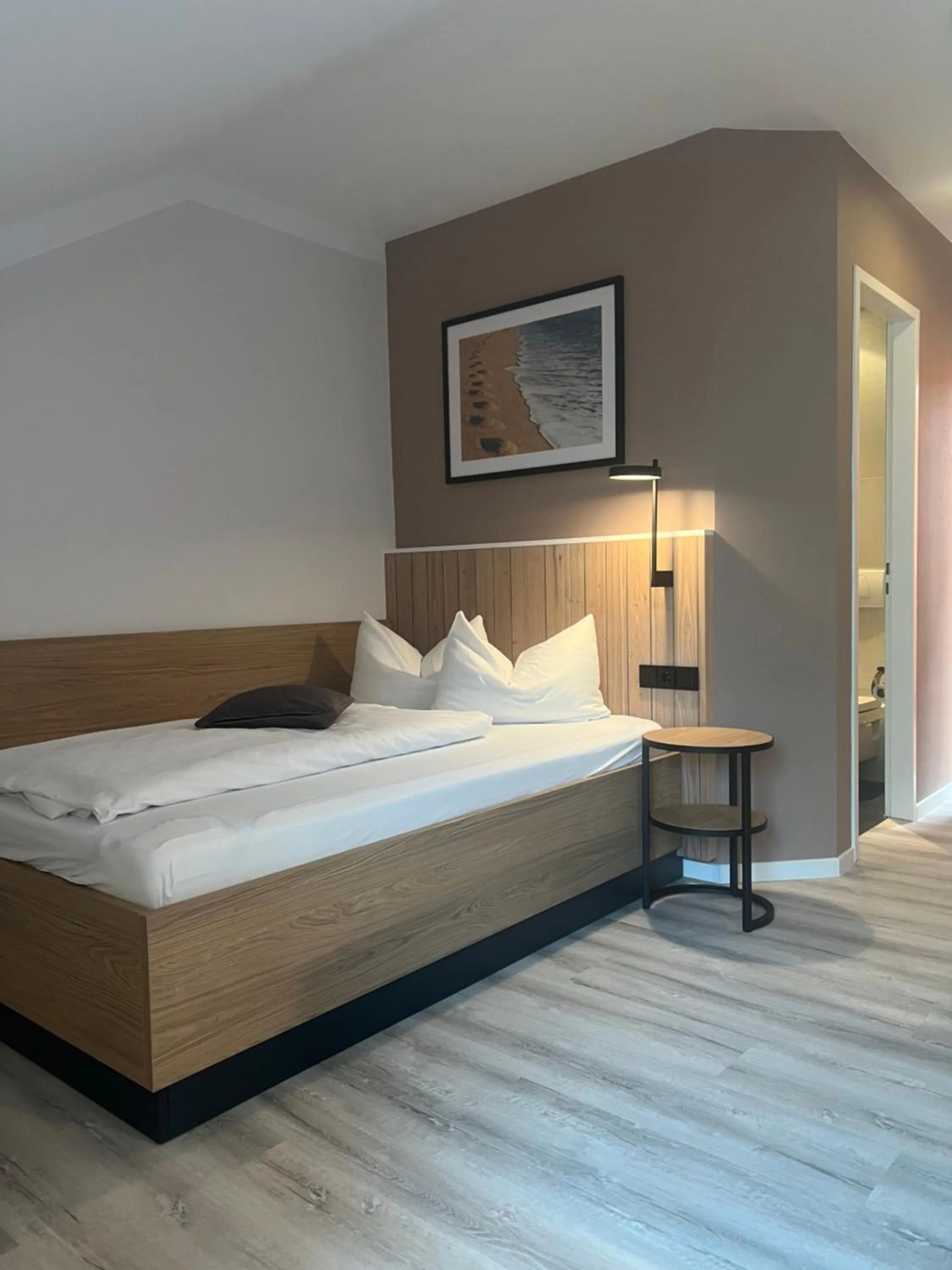 Bed in Atrium Hotel Krüger