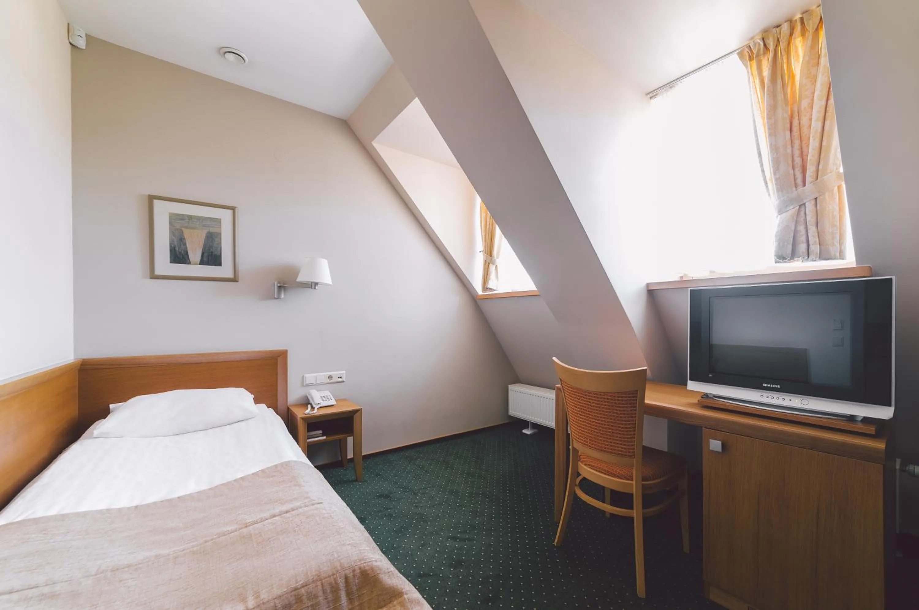 Bed in Euterpe Hotel