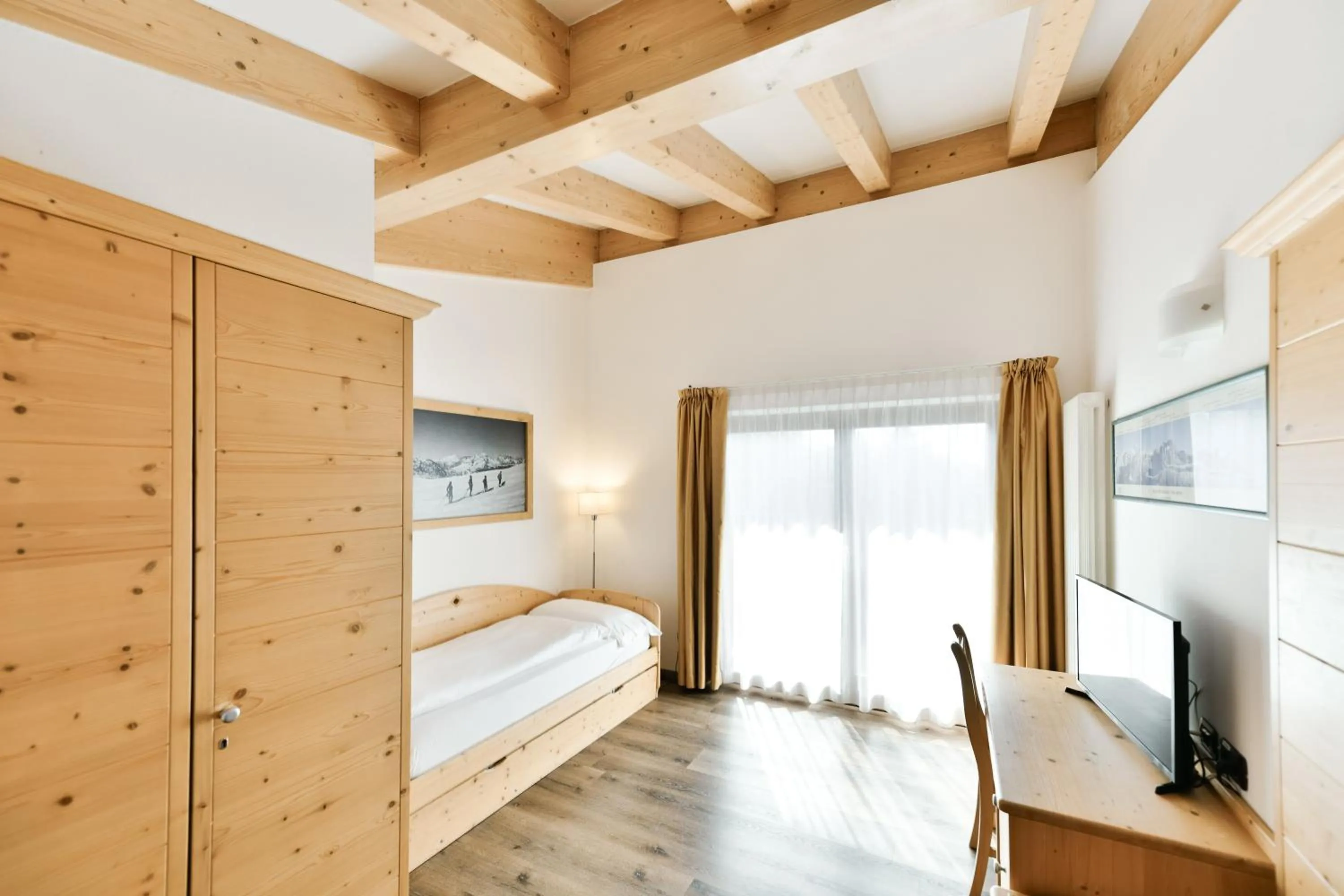 Bed in Chalet Caminetto