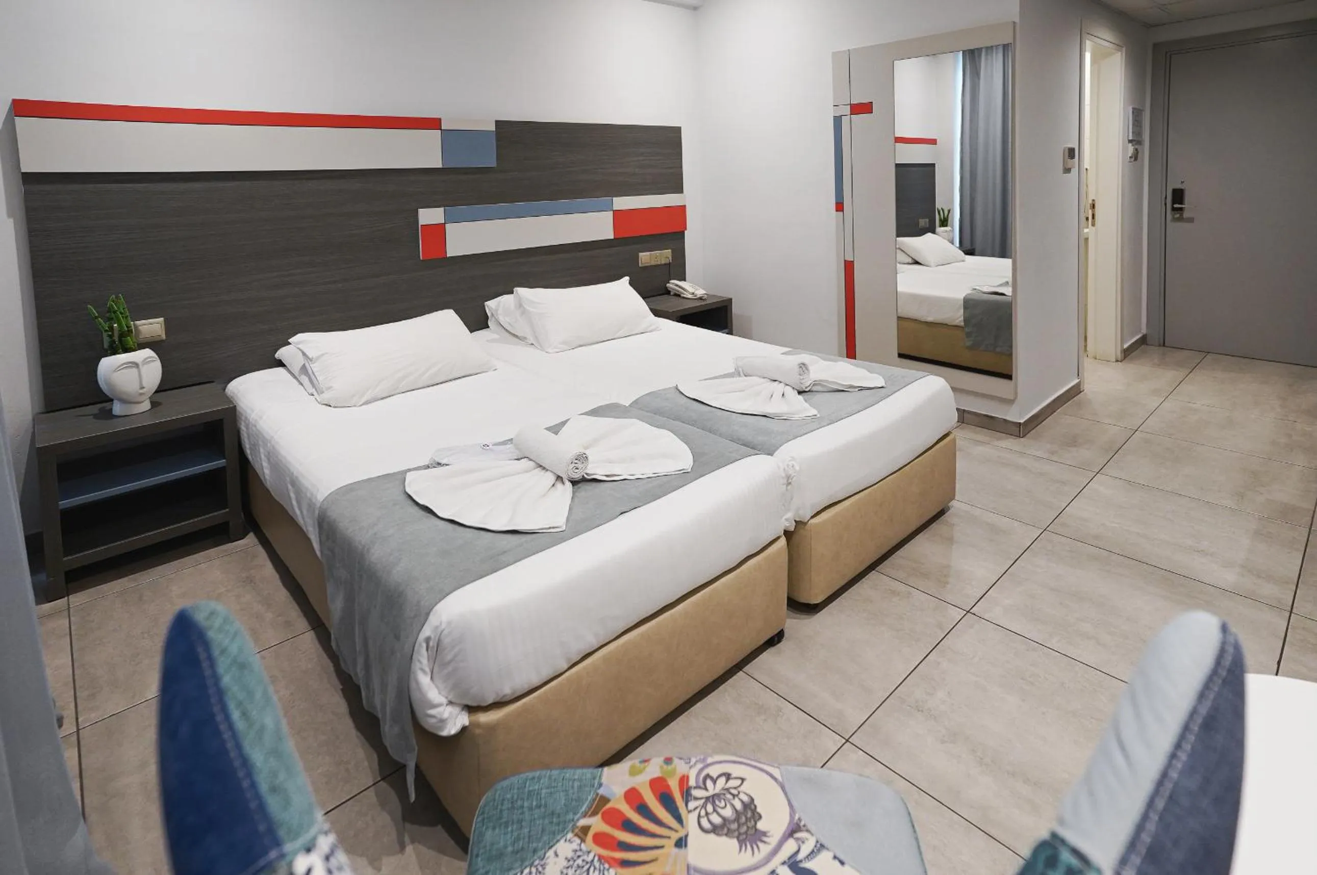 Bed in Nicholas Color Hotel