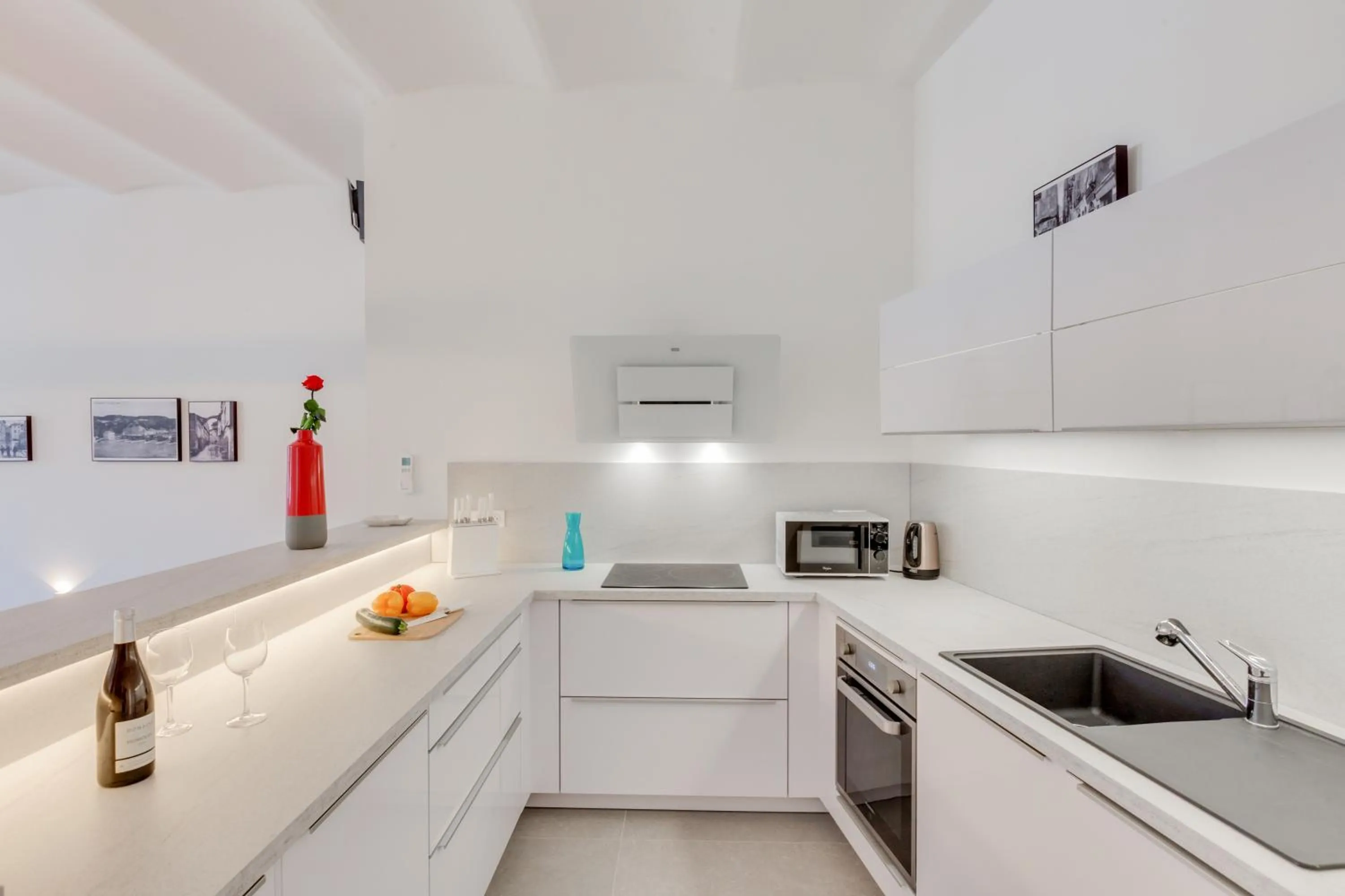 Kitchen or kitchenette in Les Appartements du Port