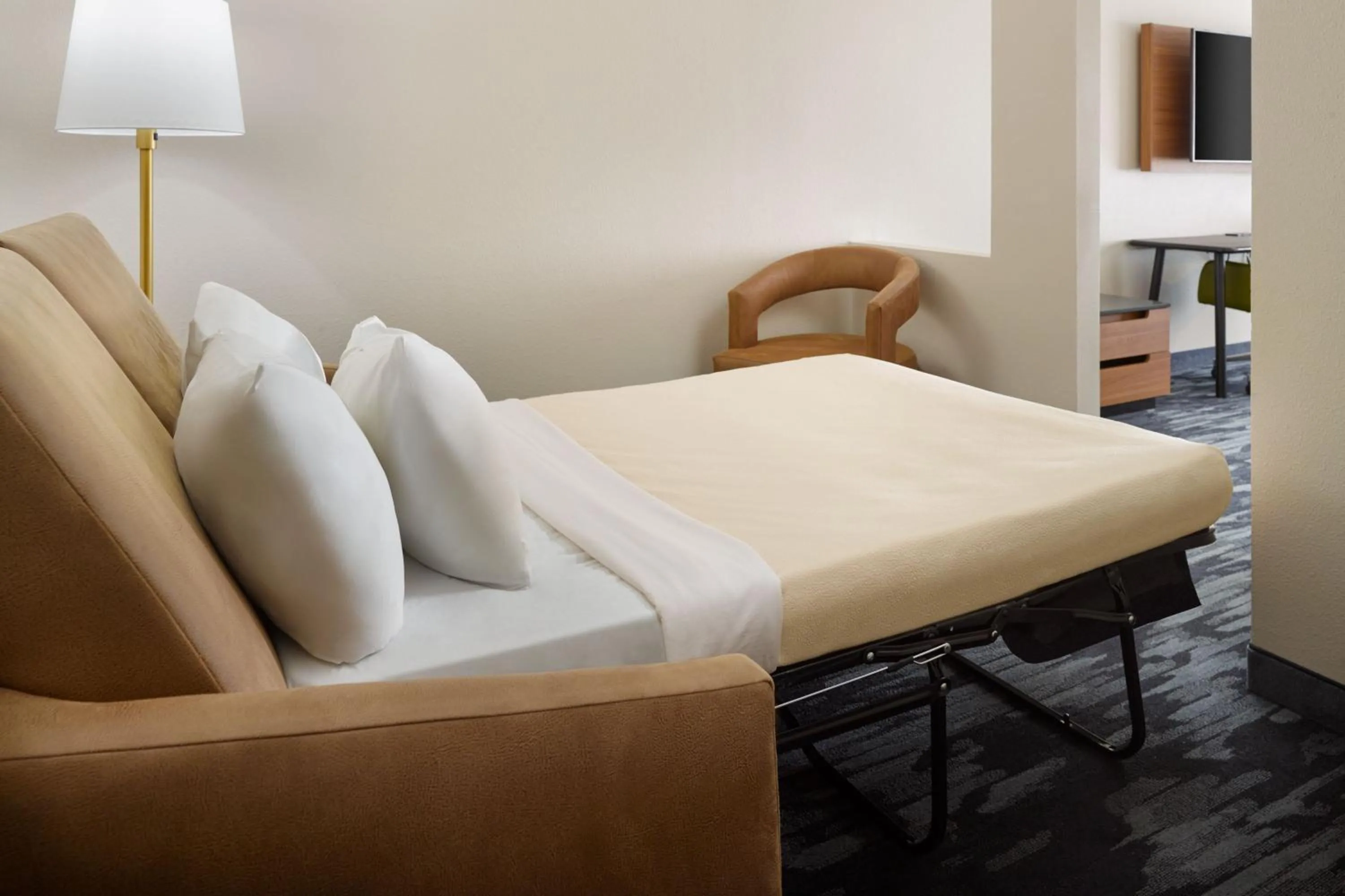 Photo of the whole room, Bed in Fairfield Inn & Suites Atlanta McDonough