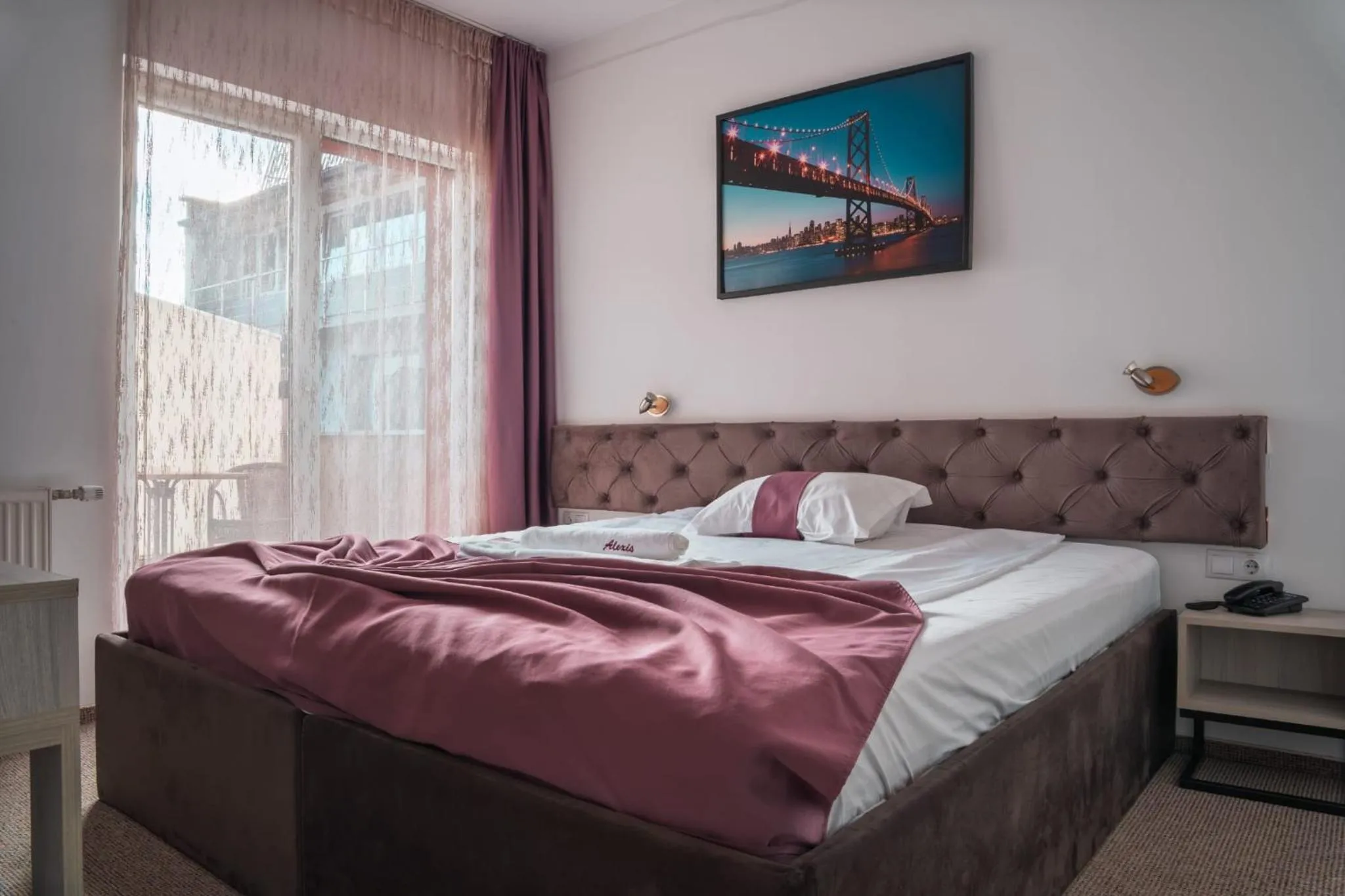 Sunrise, Bed in Hotel Alexis