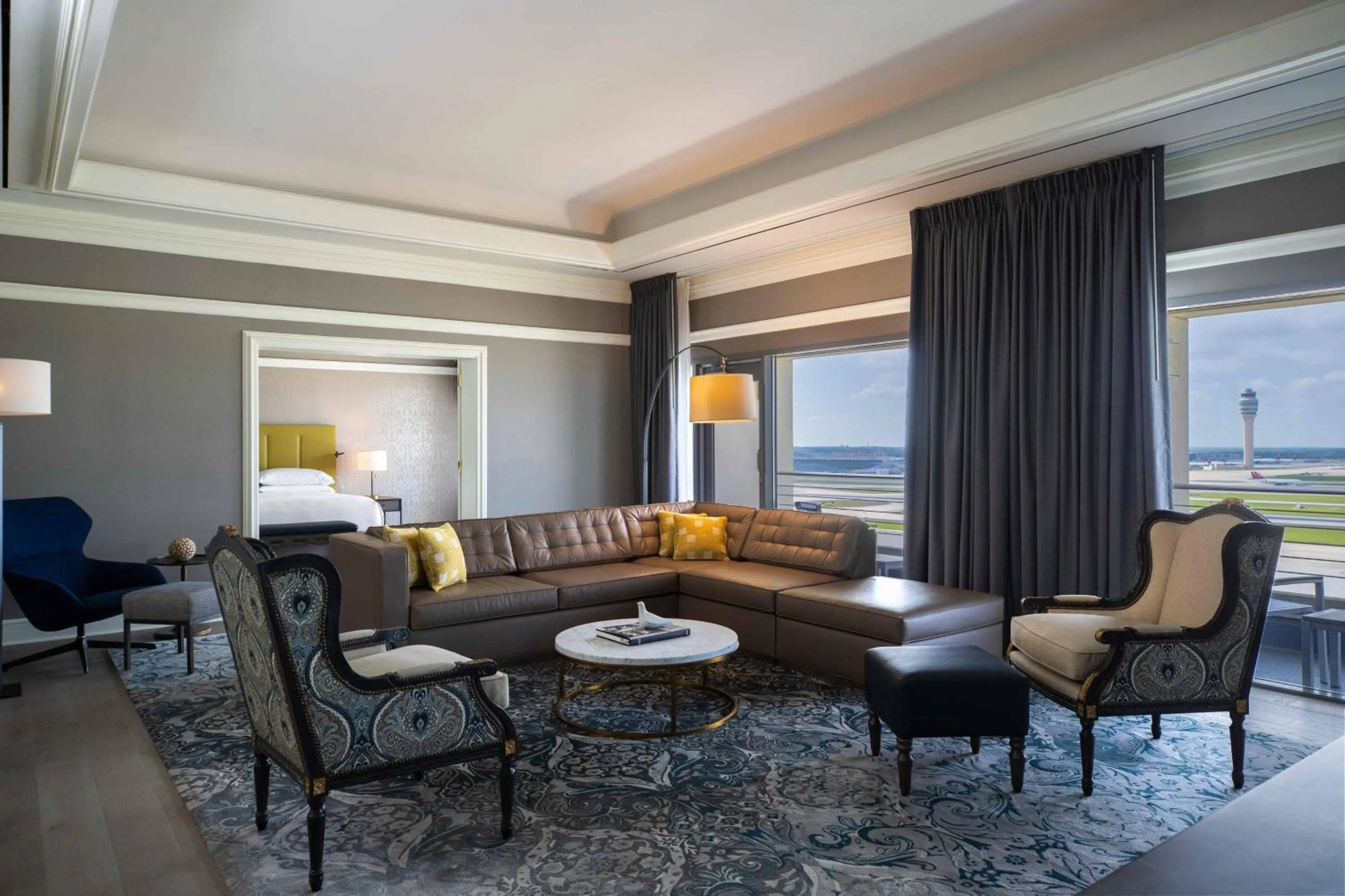 Living room in Renaissance Concourse Atlanta Airport Hotel