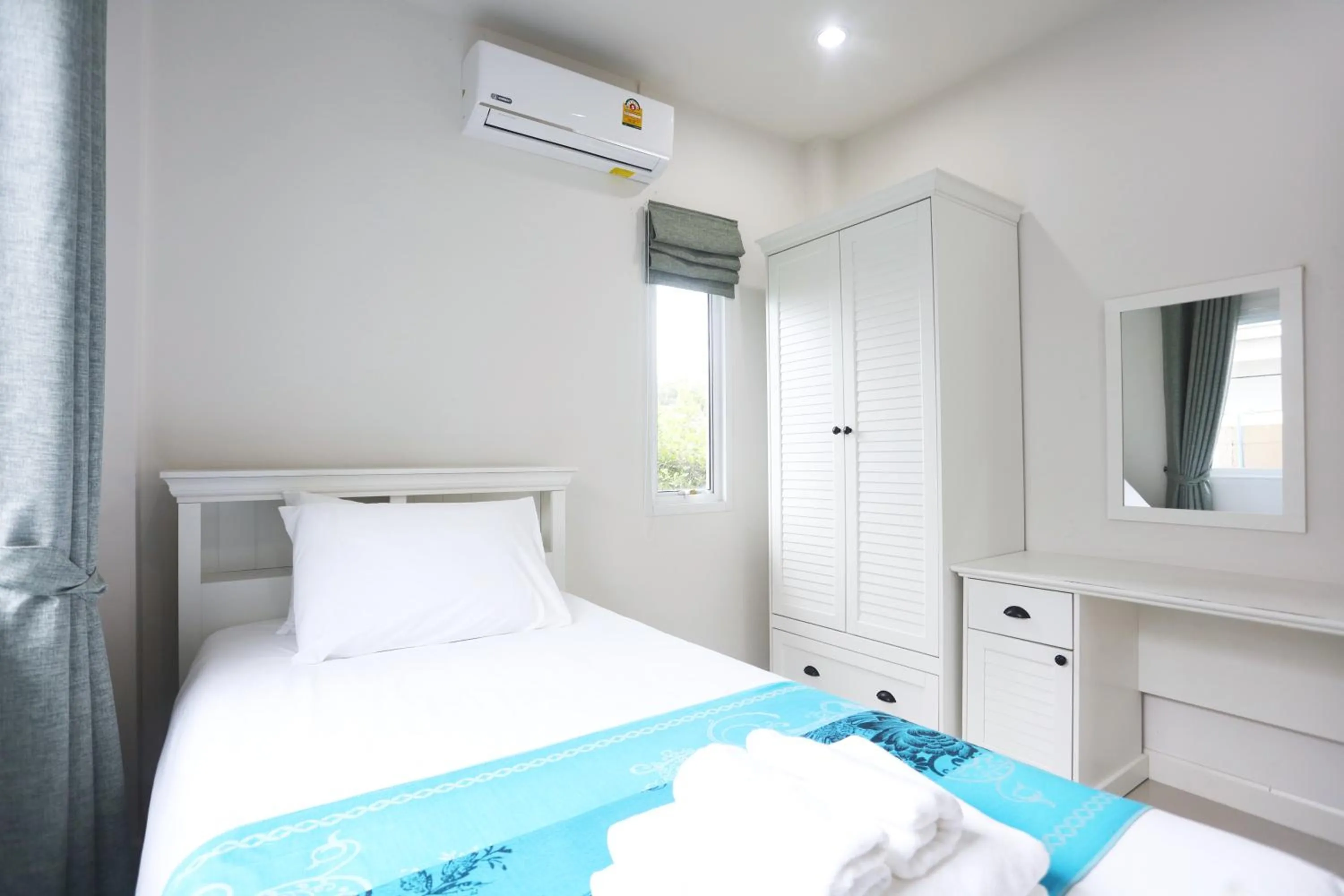 Bed in Baan Rabiengkao Hua Hin