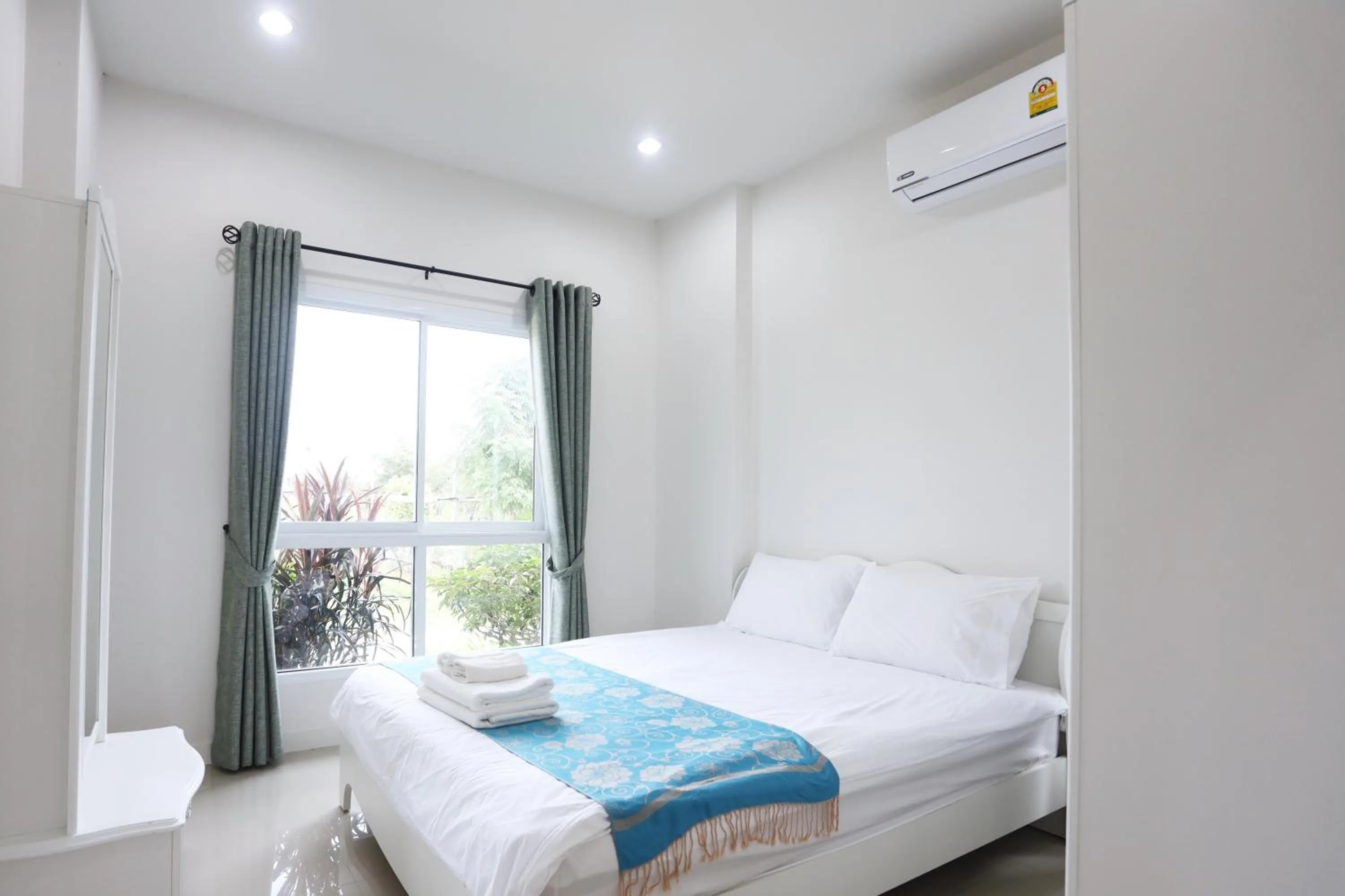 Bed in Baan Rabiengkao Hua Hin