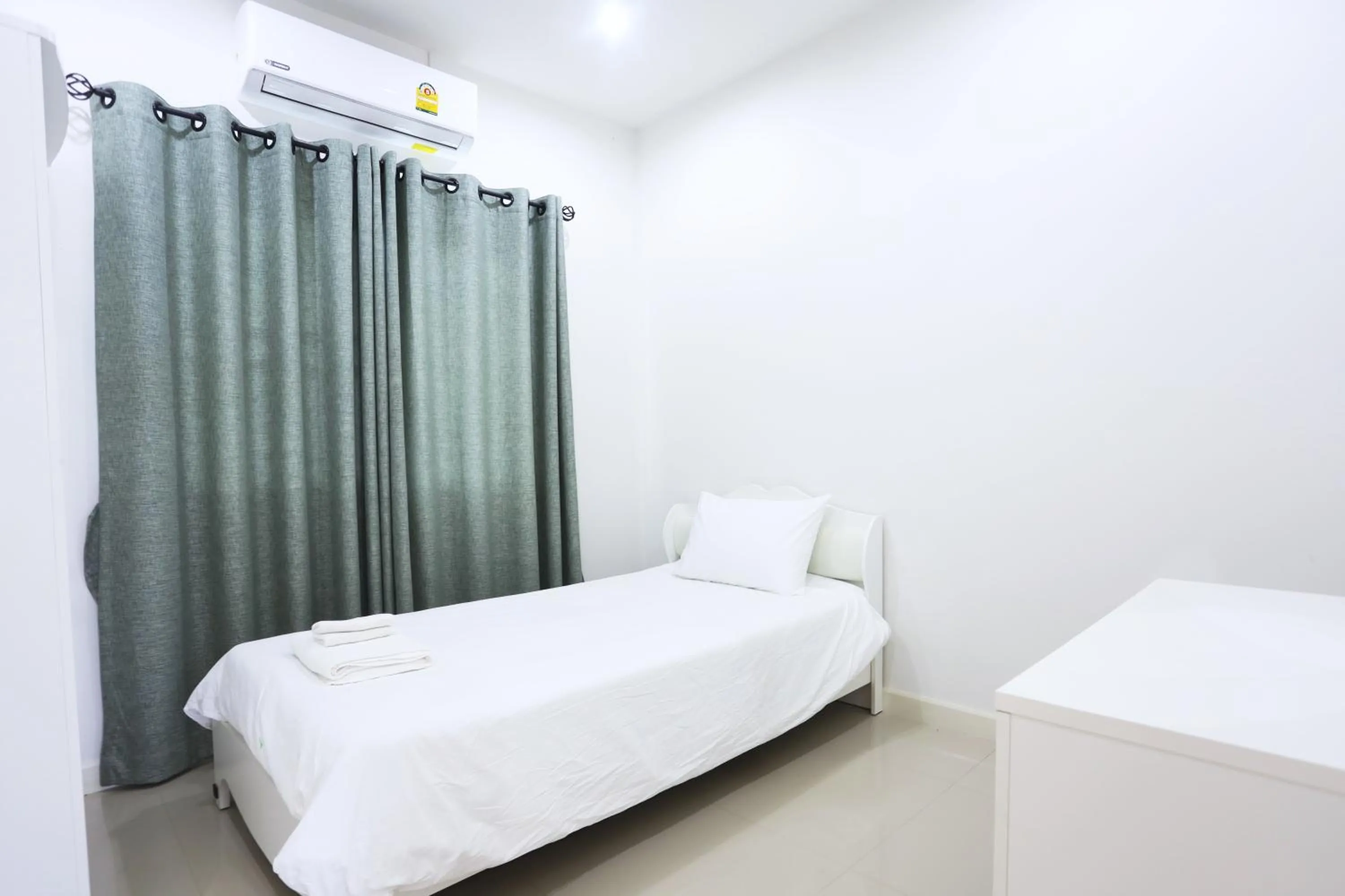 Bed in Baan Rabiengkao Hua Hin