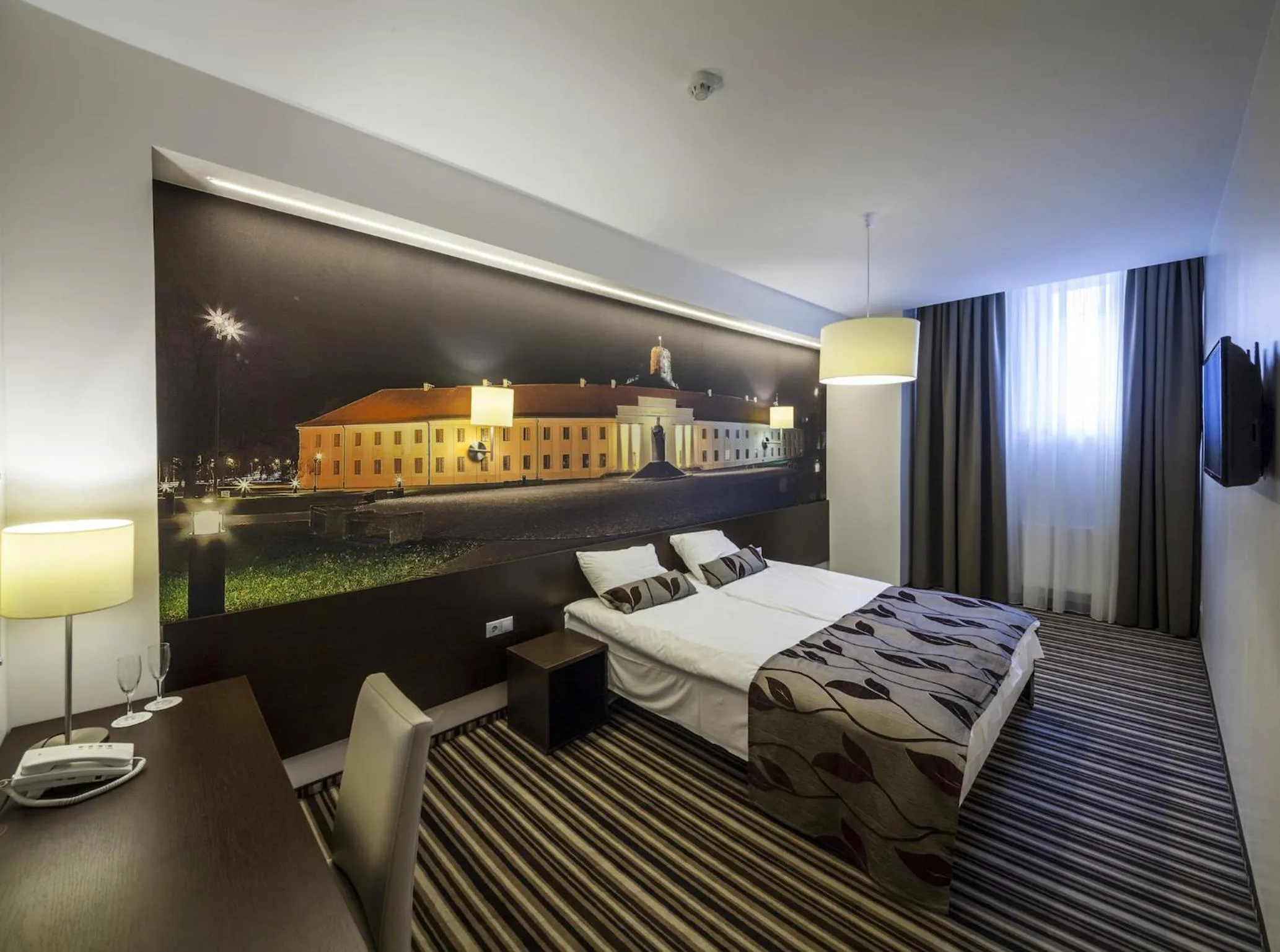 Living room, Bed in Vilnius City Hotel