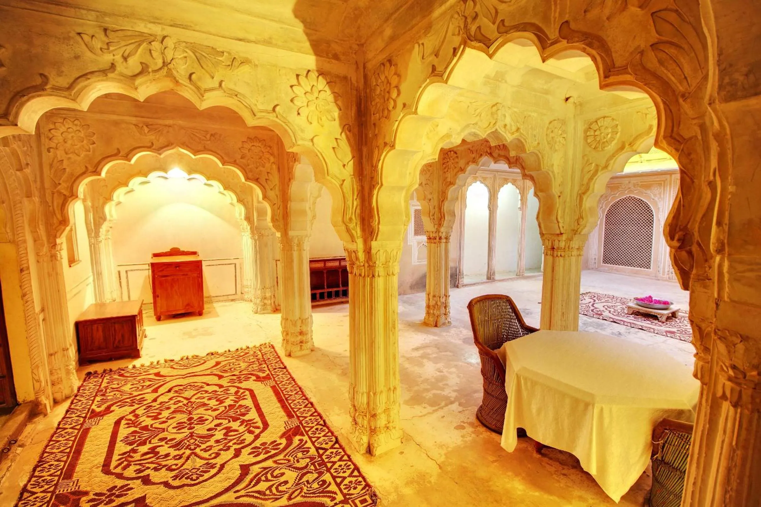 Seating area, Bed in The Fort Pokaran