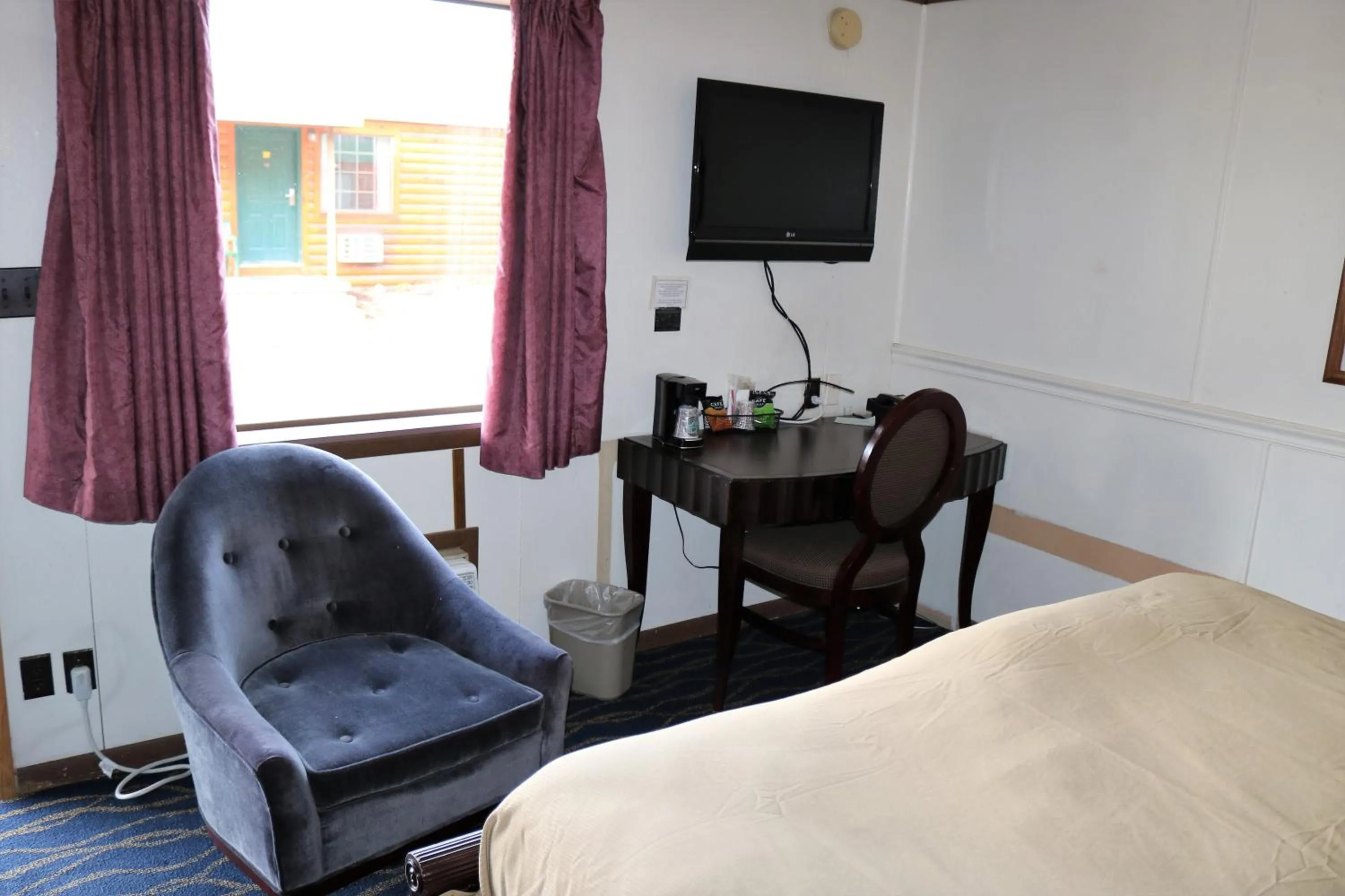 TV and multimedia, Bed in Rodeway Inn Harlan