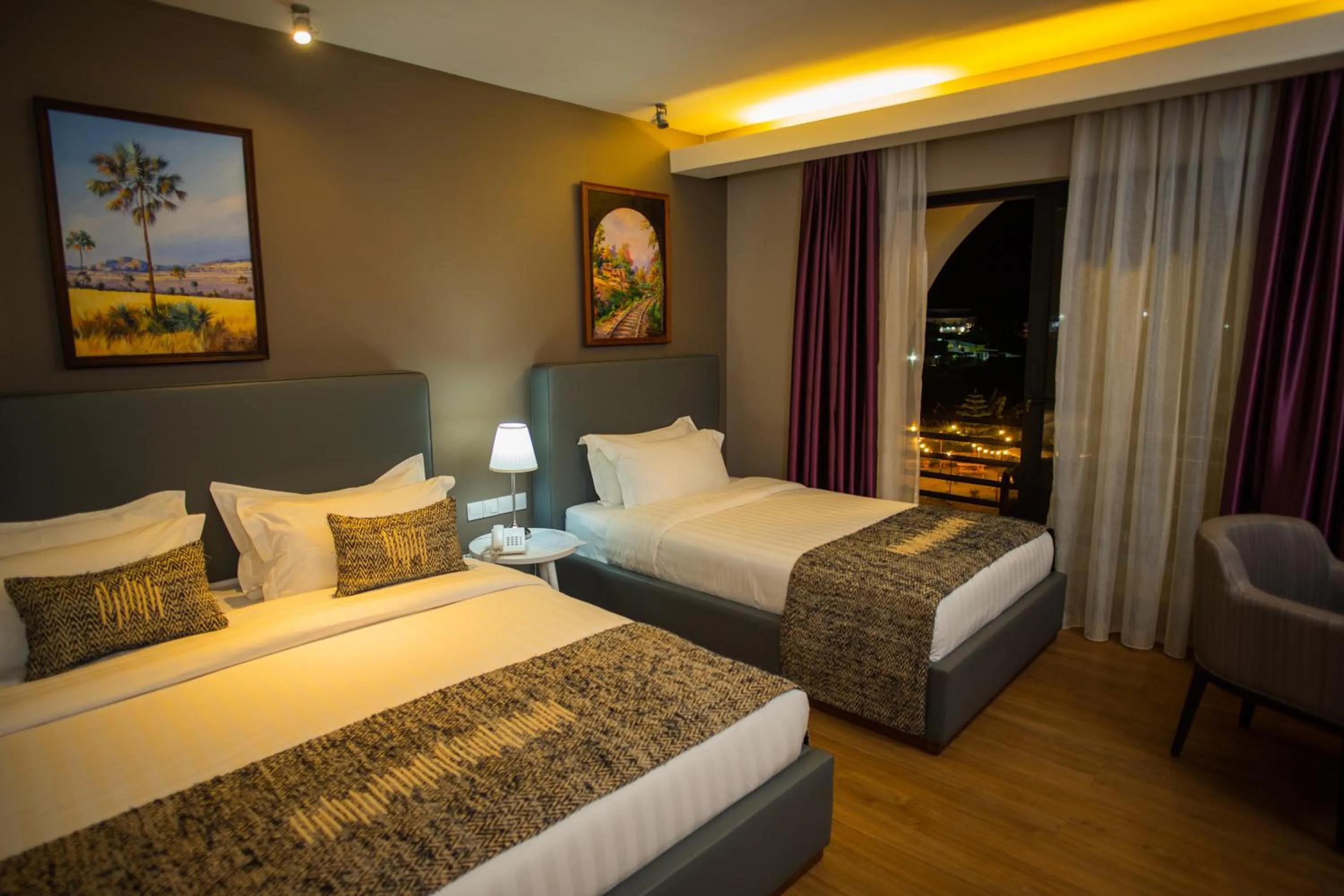 Photo of the whole room, Bed in San Cristobal Boutique Hotel - Ivato Airport