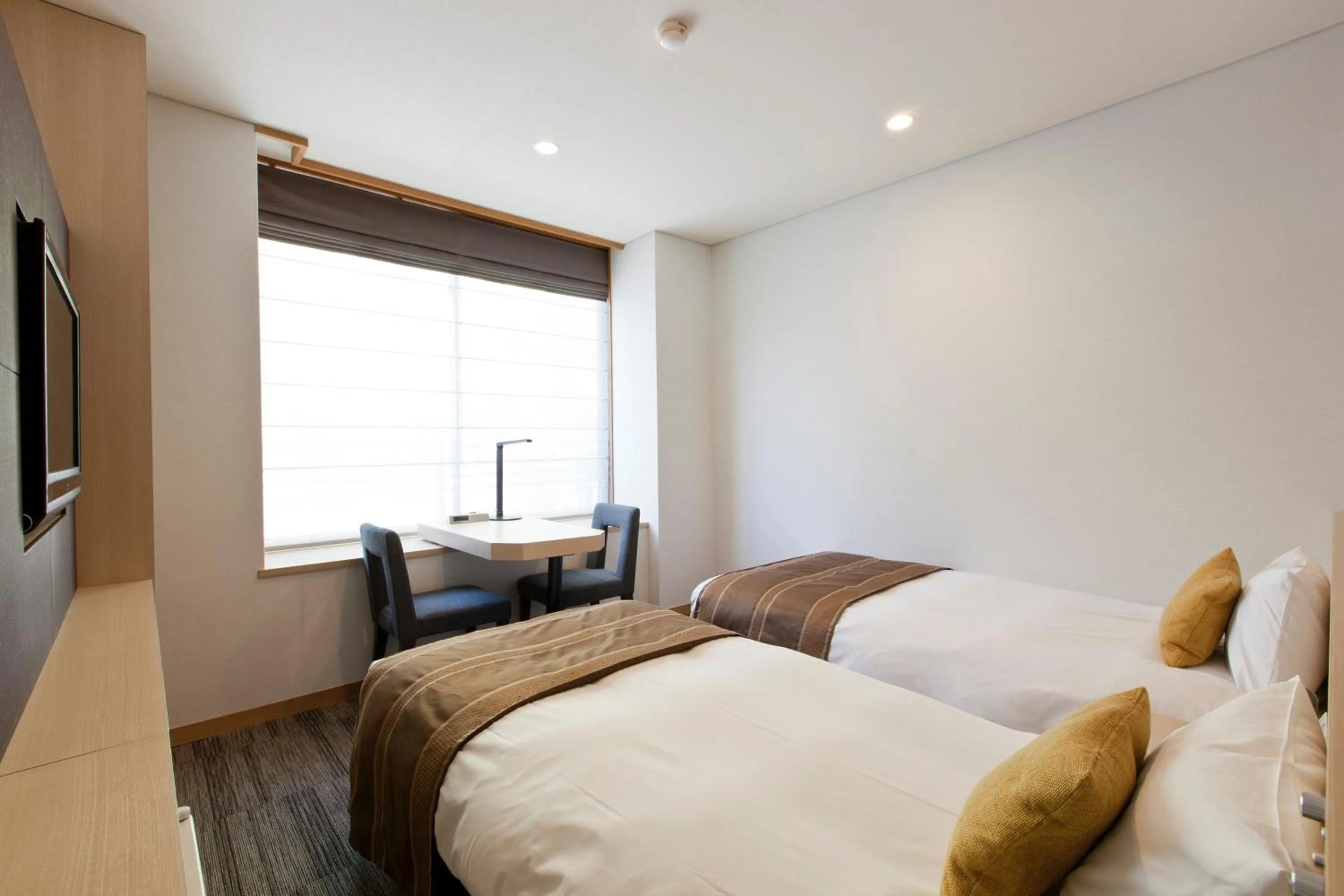 Bed in Miyajima Grand Hotel Arimoto