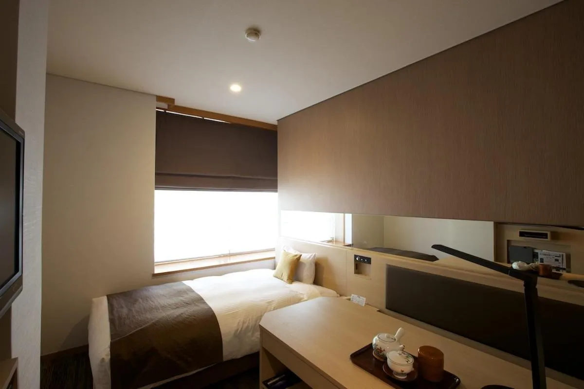 Bed in Miyajima Grand Hotel Arimoto