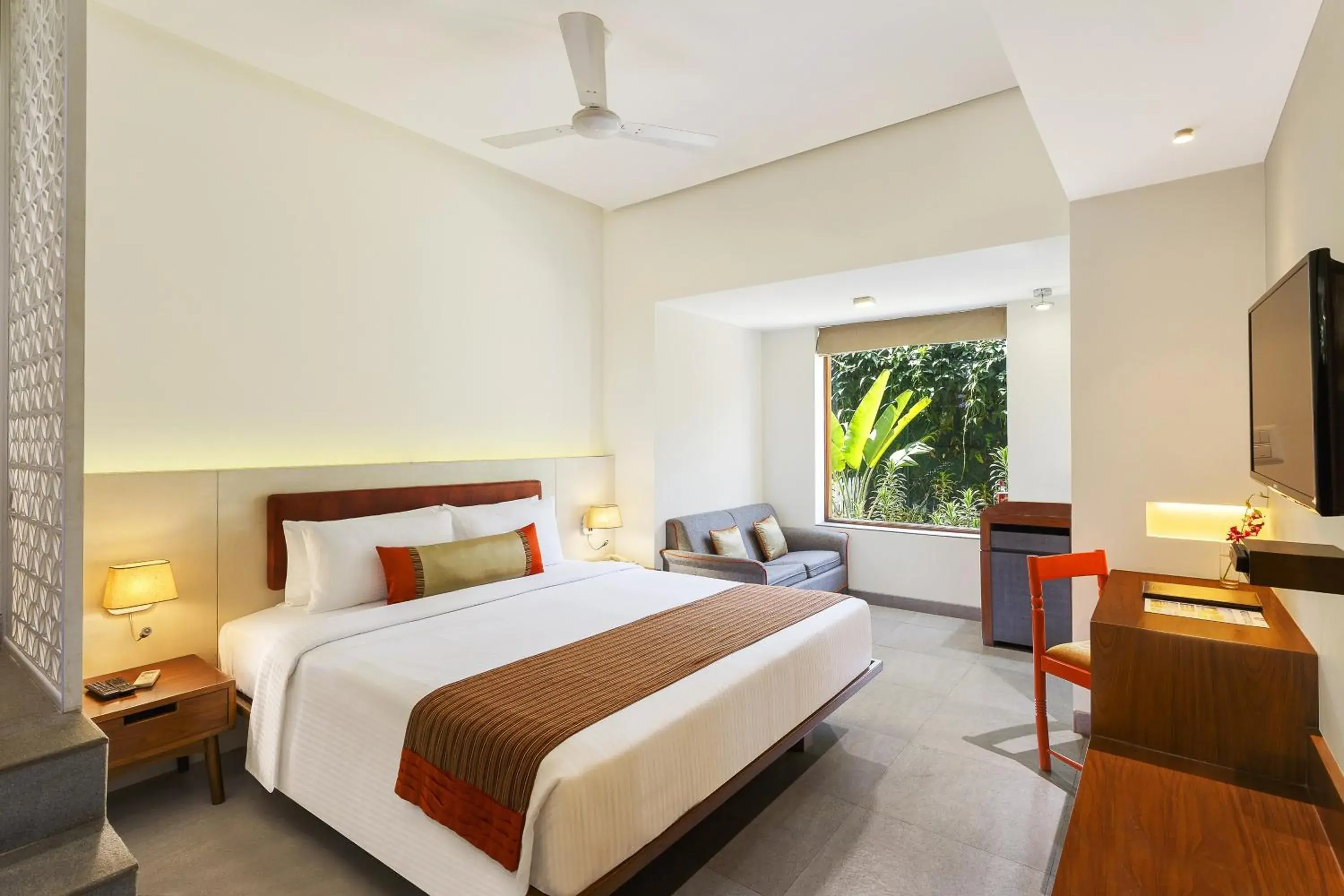 Deluxe Double Room with Garden View(2 pints of beer on arrival with each rooms booked) in Lazy Lagoon, Baga A Lemon Tree Resort, Goa Deluxe Double Room with Garden View(2 pints of beer on arrival with each rooms booked) in Lazy Lagoon, Baga A Lemon Tree Resort, Goa
