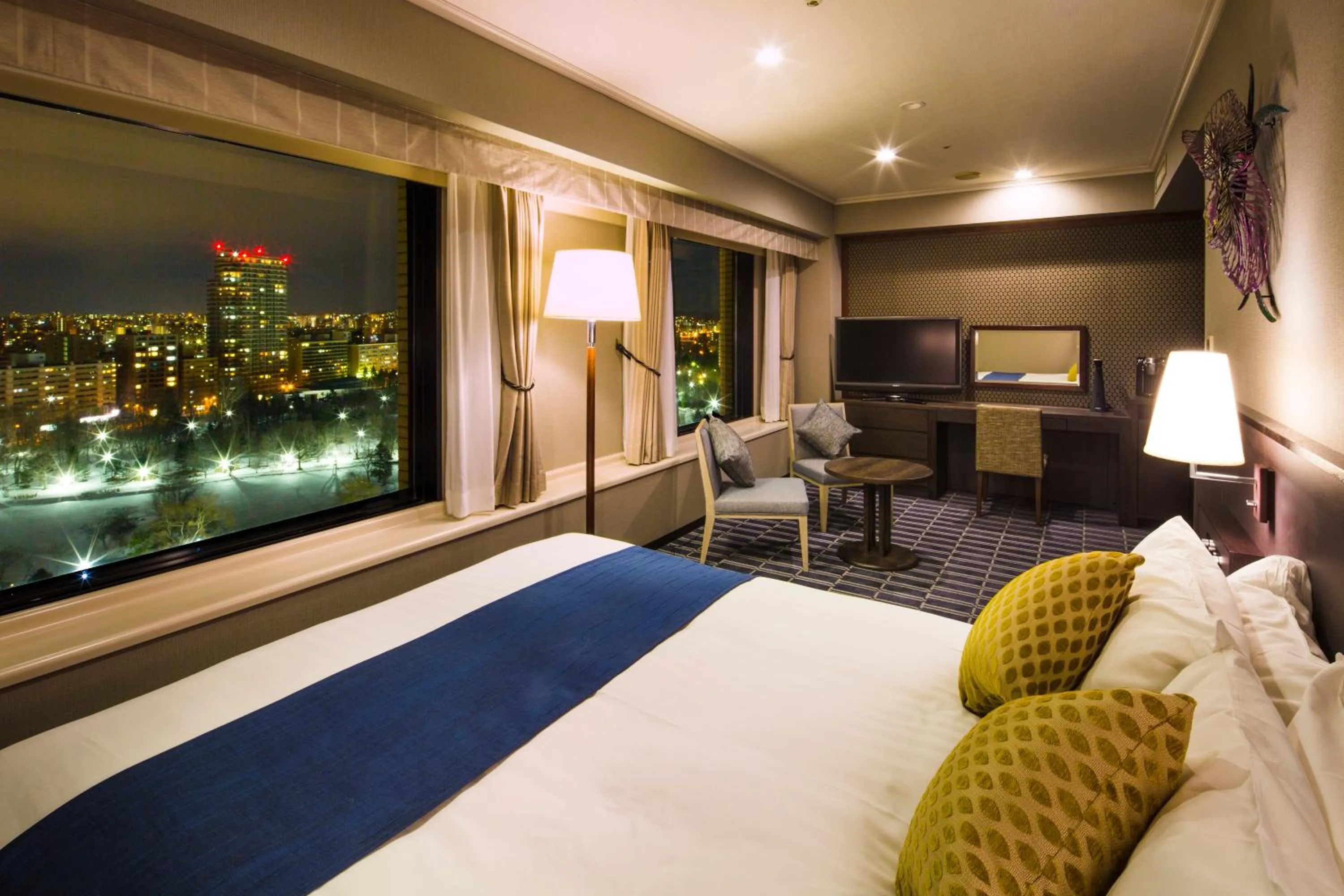 Bed in Premier Hotel Nakajima Park Sapporo