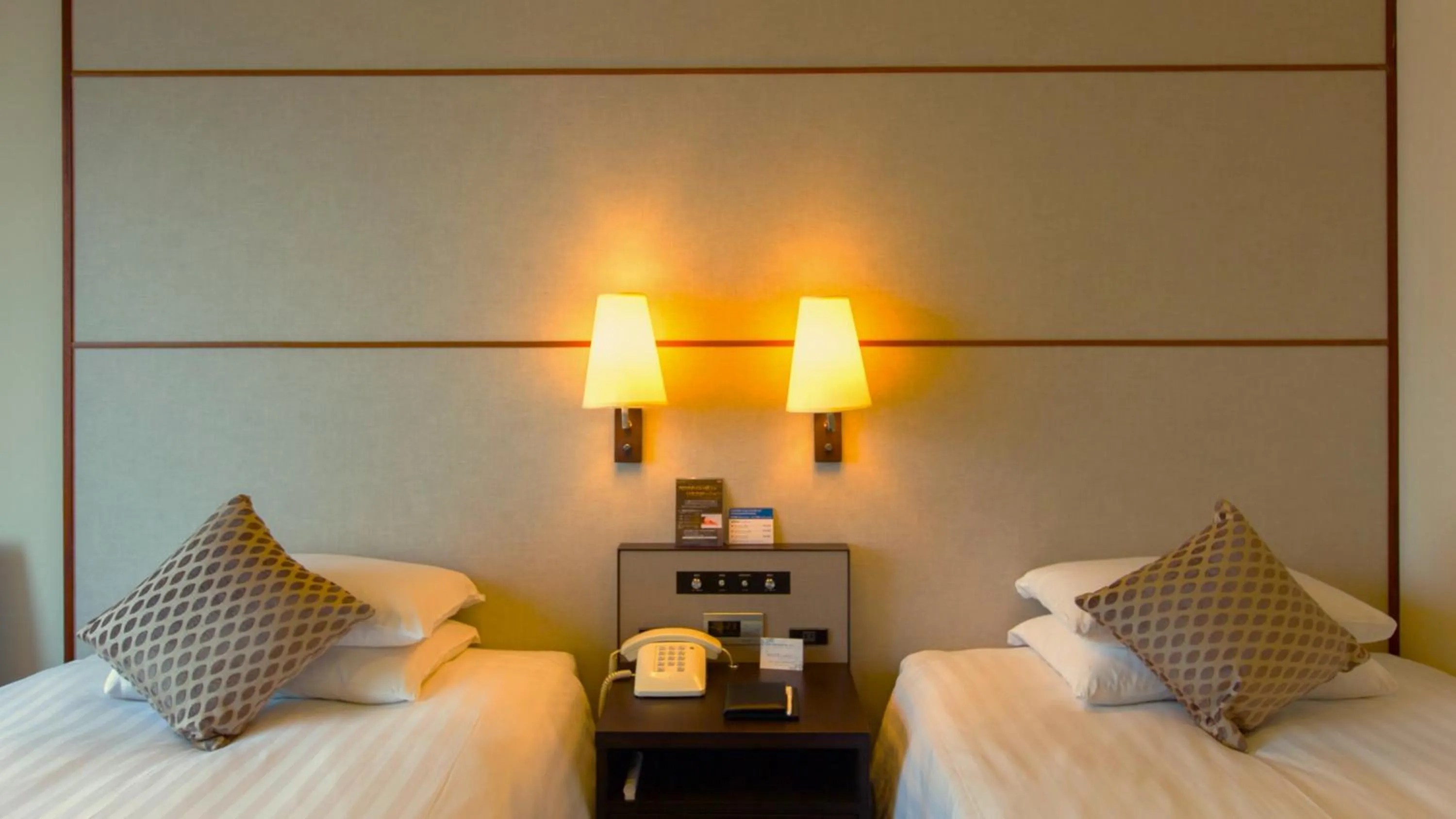 Bed in Premier Hotel Nakajima Park Sapporo