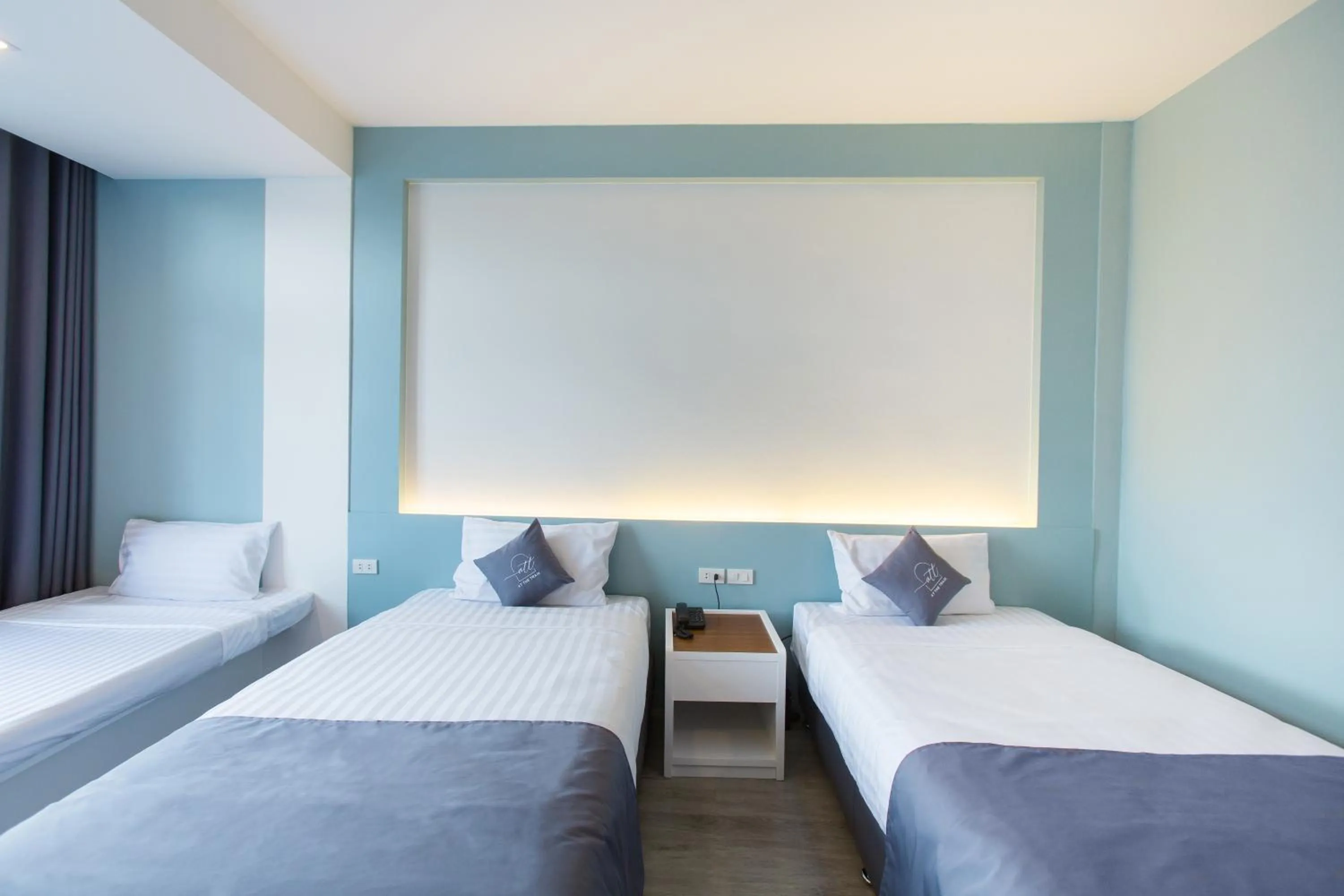 Bed in At the Train Chiang Mai Hotel