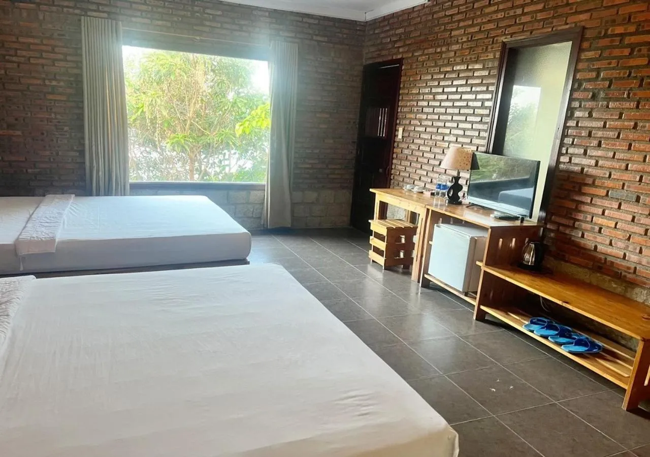 Photo of the whole room, Bed in Wild Beach Boutique Resort