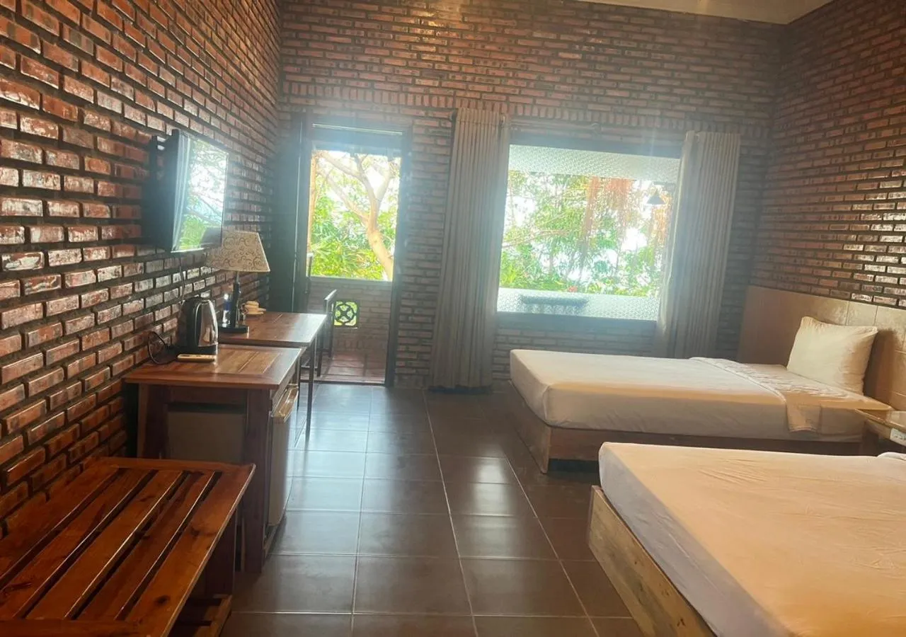 Photo of the whole room, Bed in Wild Beach Boutique Resort