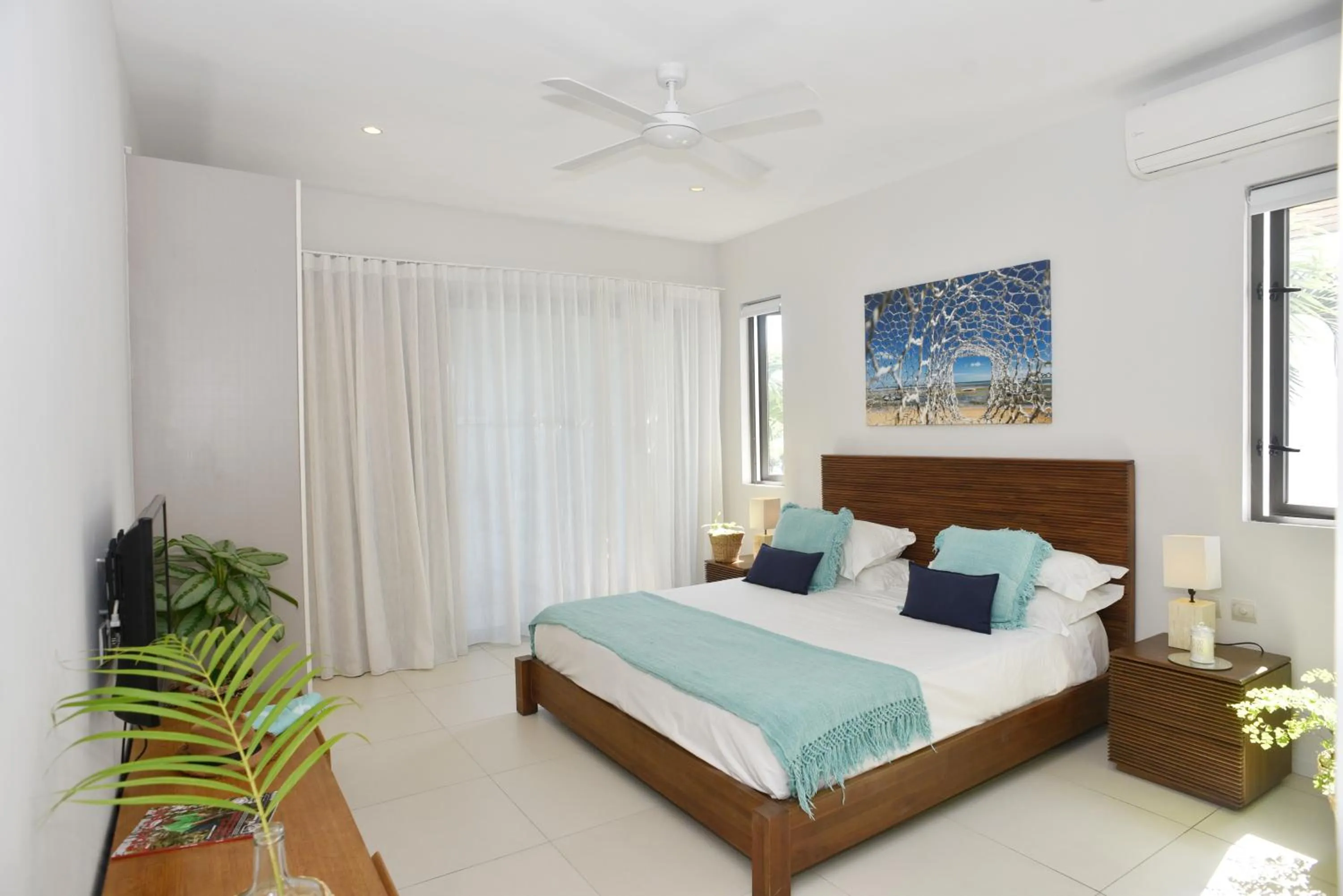 Bed in Cap Ouest Beachfront Luxury Penthouse & Apartment