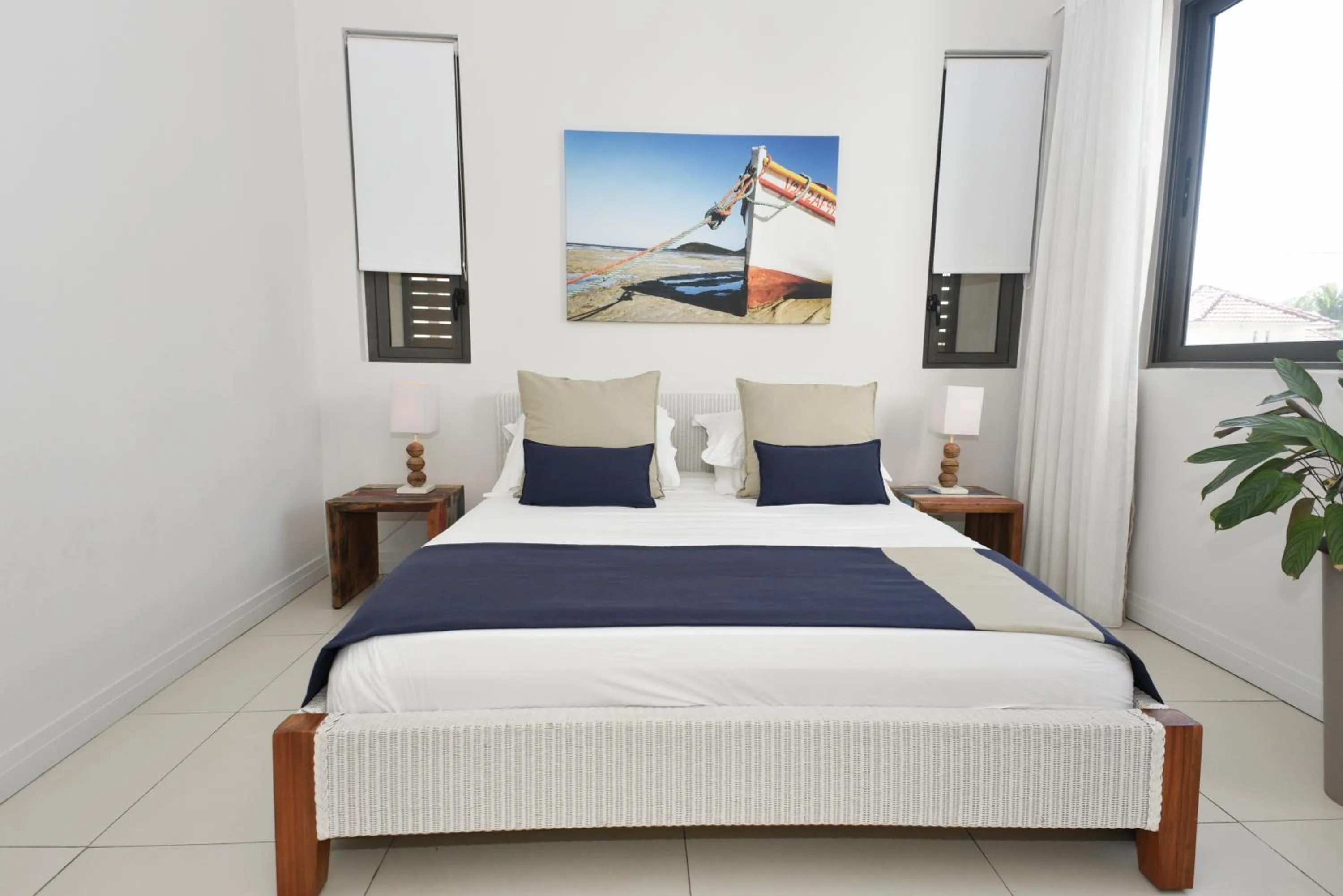 Bed in Cap Ouest Beachfront Luxury Penthouse & Apartment