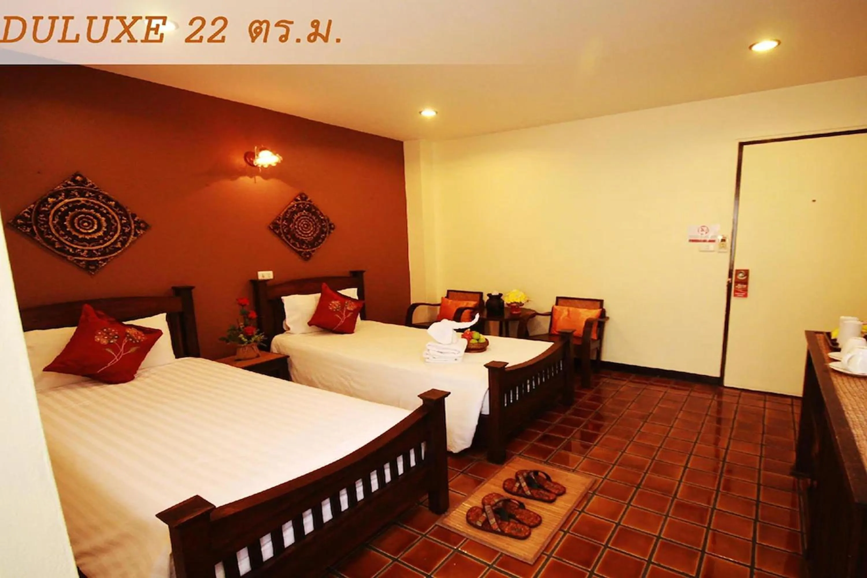 Bed in CM Night Bazaar Boutique Hotel - โรงแรม ซี เอ็ม ไนท์บาซาร์ บูทีค