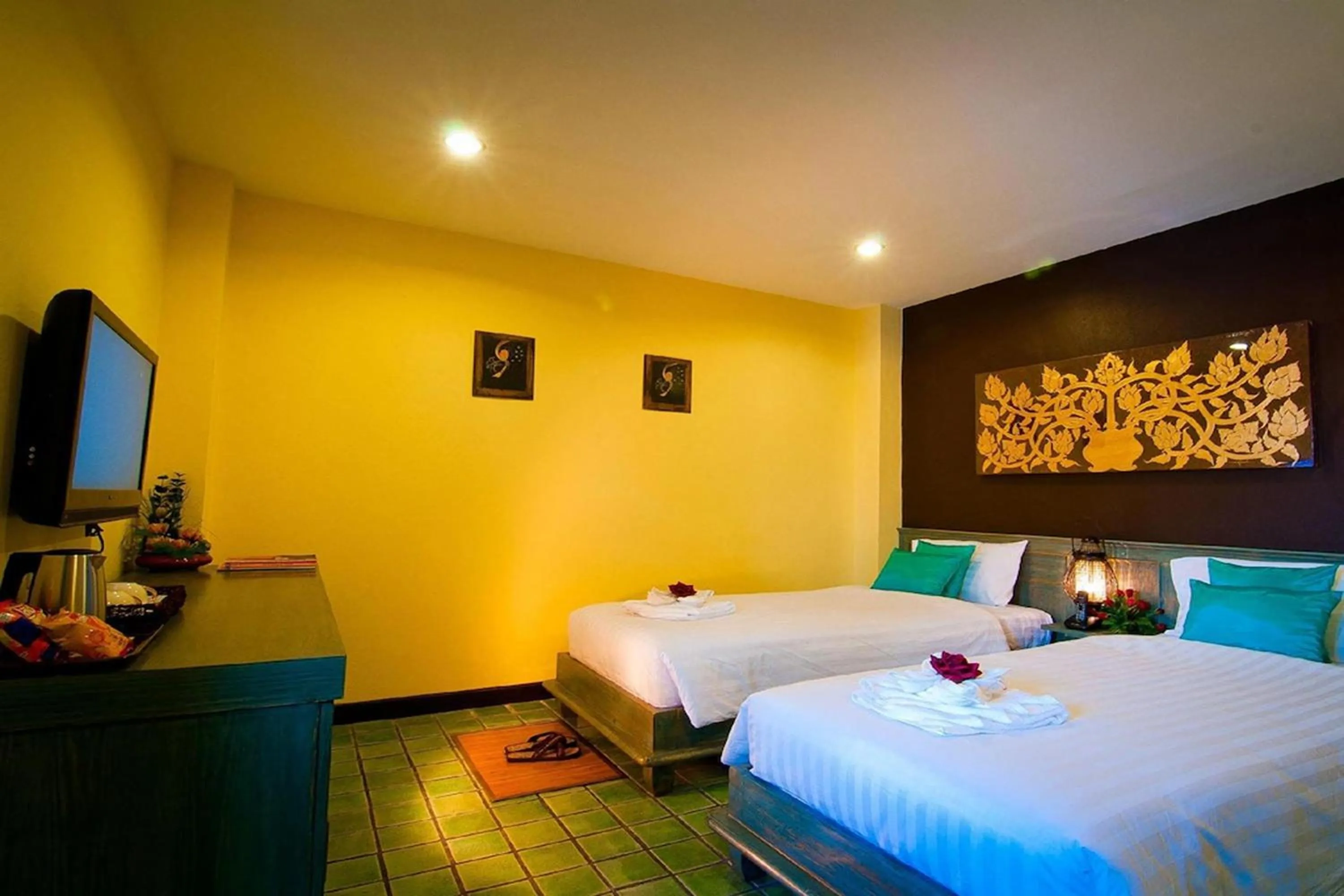 Bed in CM Night Bazaar Boutique Hotel - โรงแรม ซี เอ็ม ไนท์บาซาร์ บูทีค