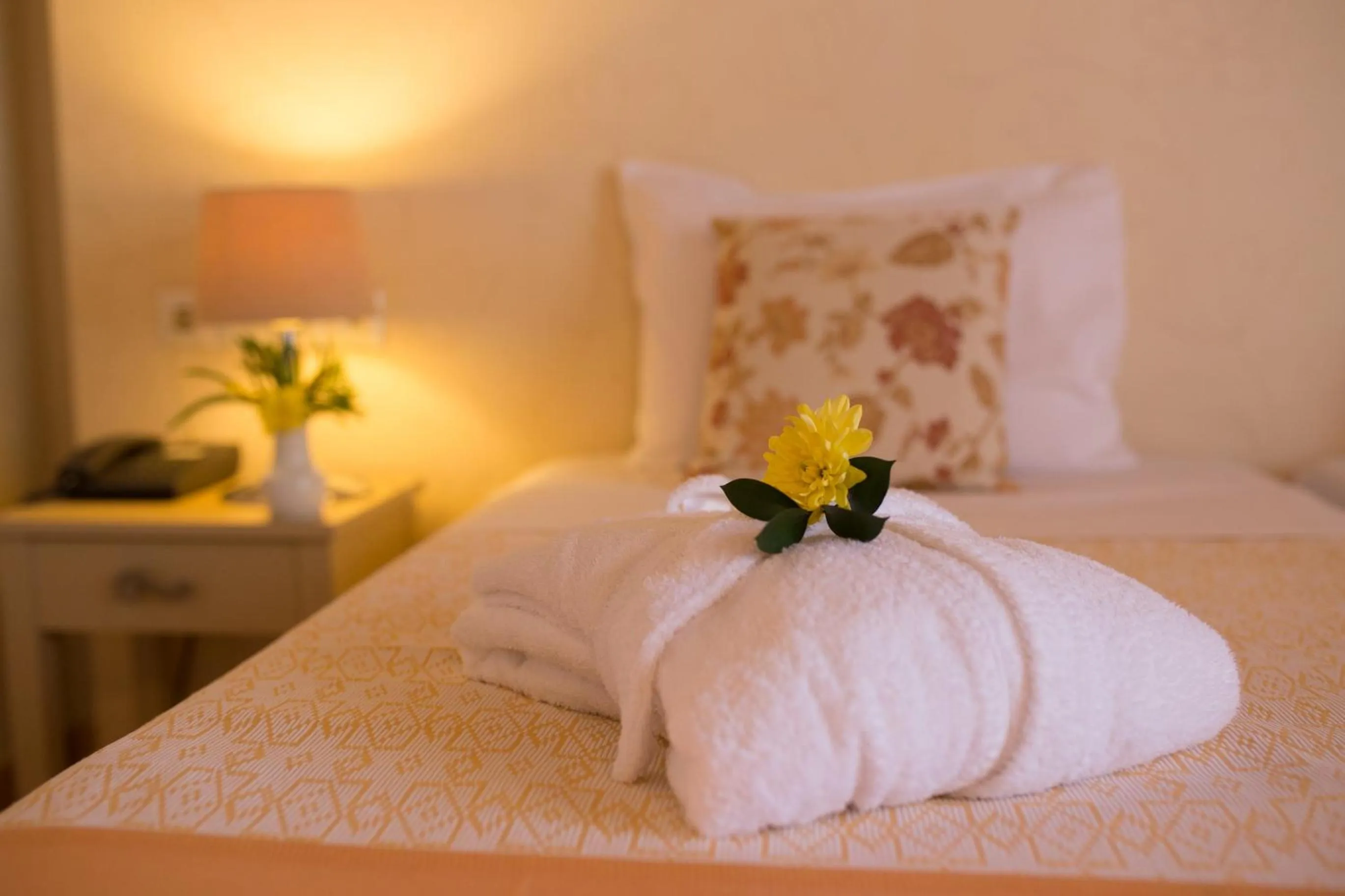 Bed in Sunrise Resort Hotel