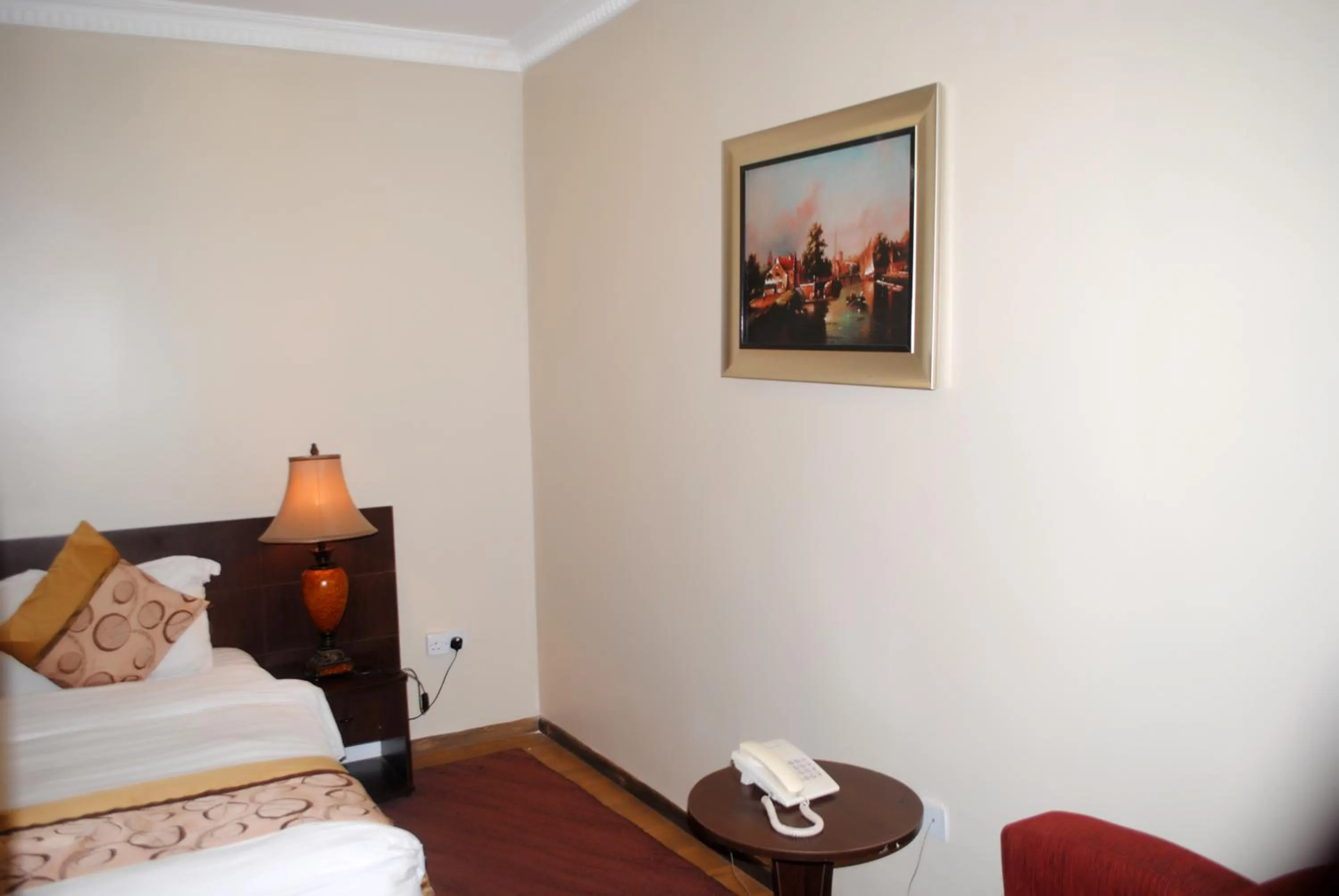 Bed in Grand Inn & Suites