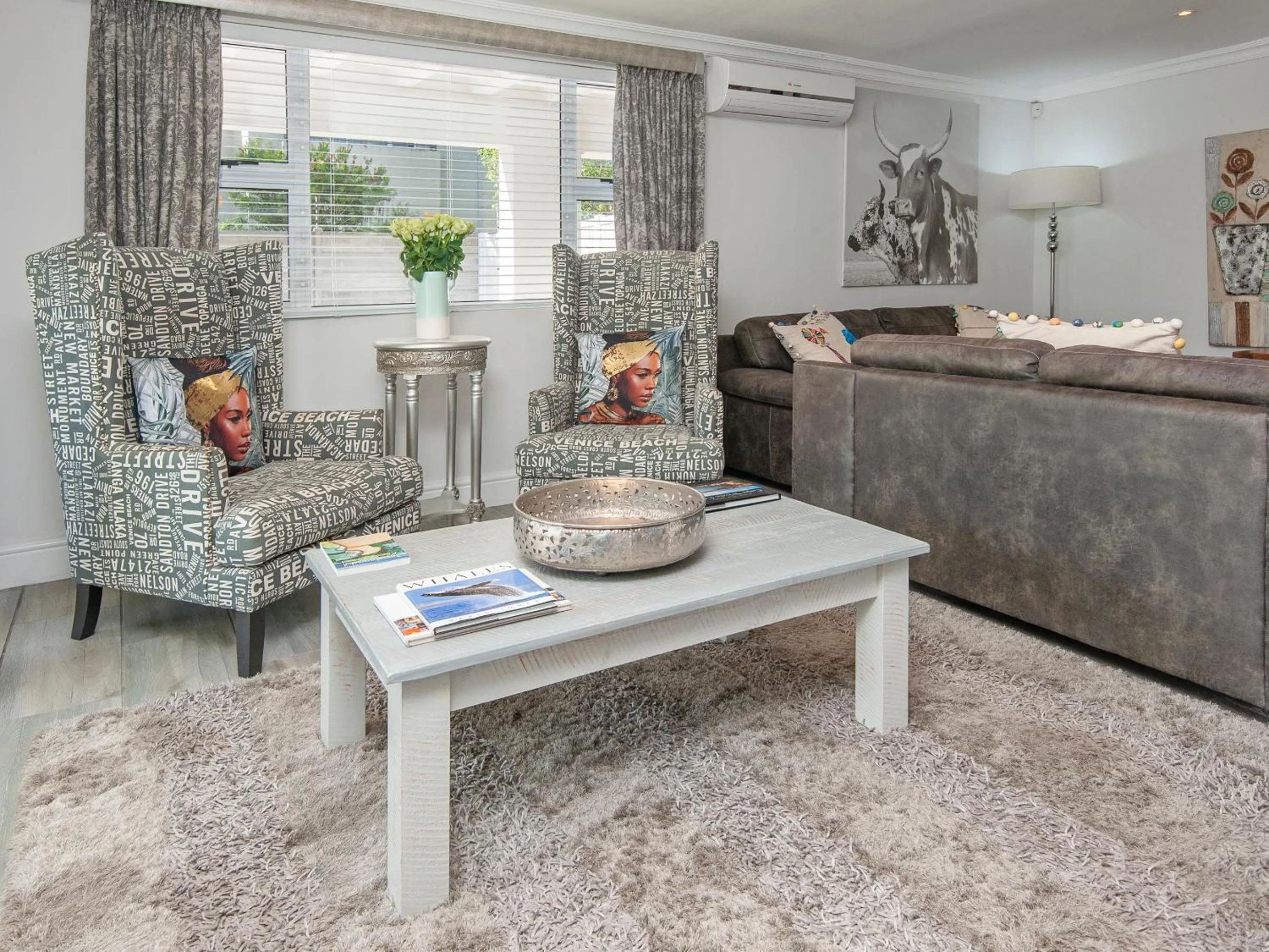 Communal lounge/ TV room in Oude Schuur Boutique Guesthouse