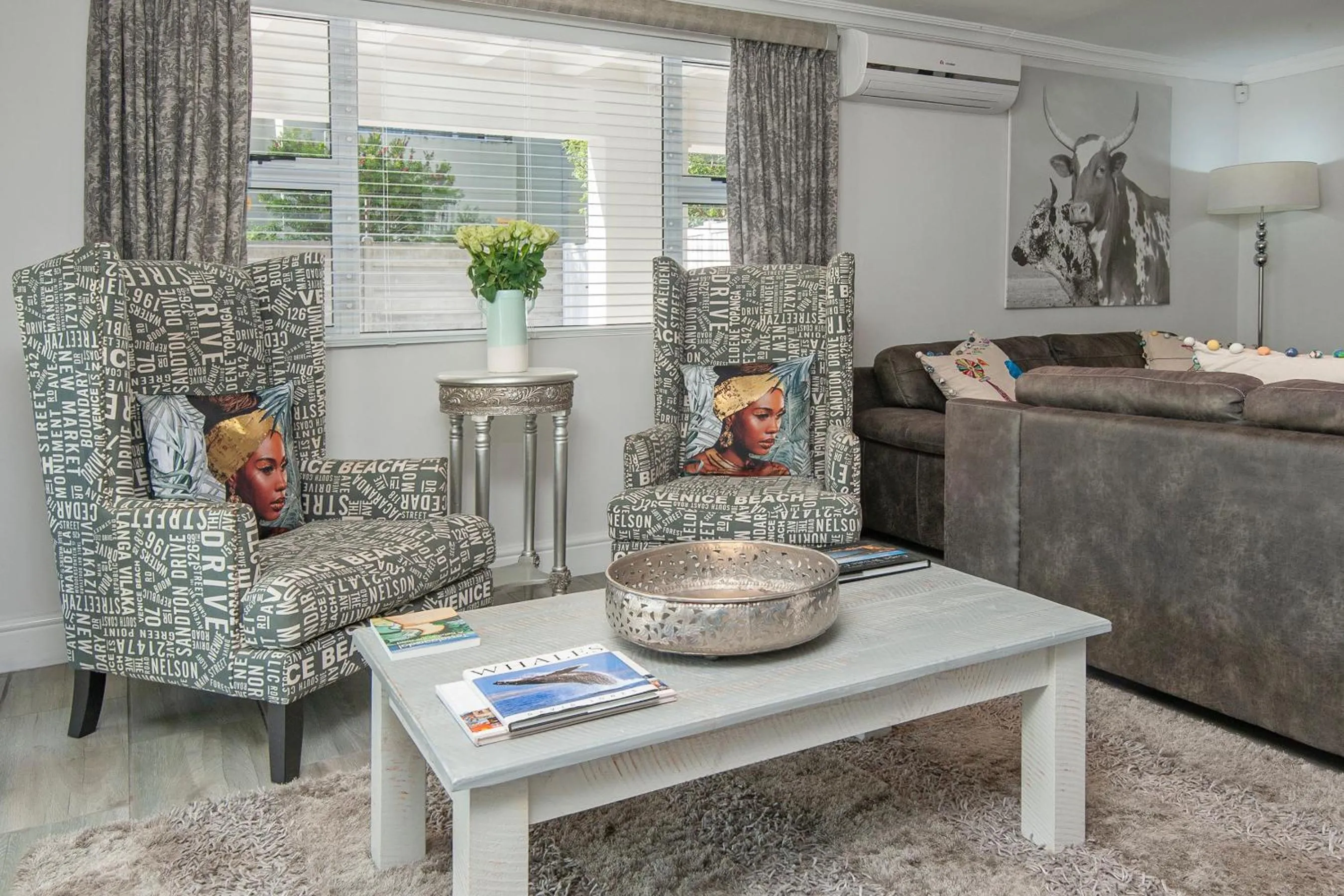 Communal lounge/ TV room in Oude Schuur Boutique Guesthouse